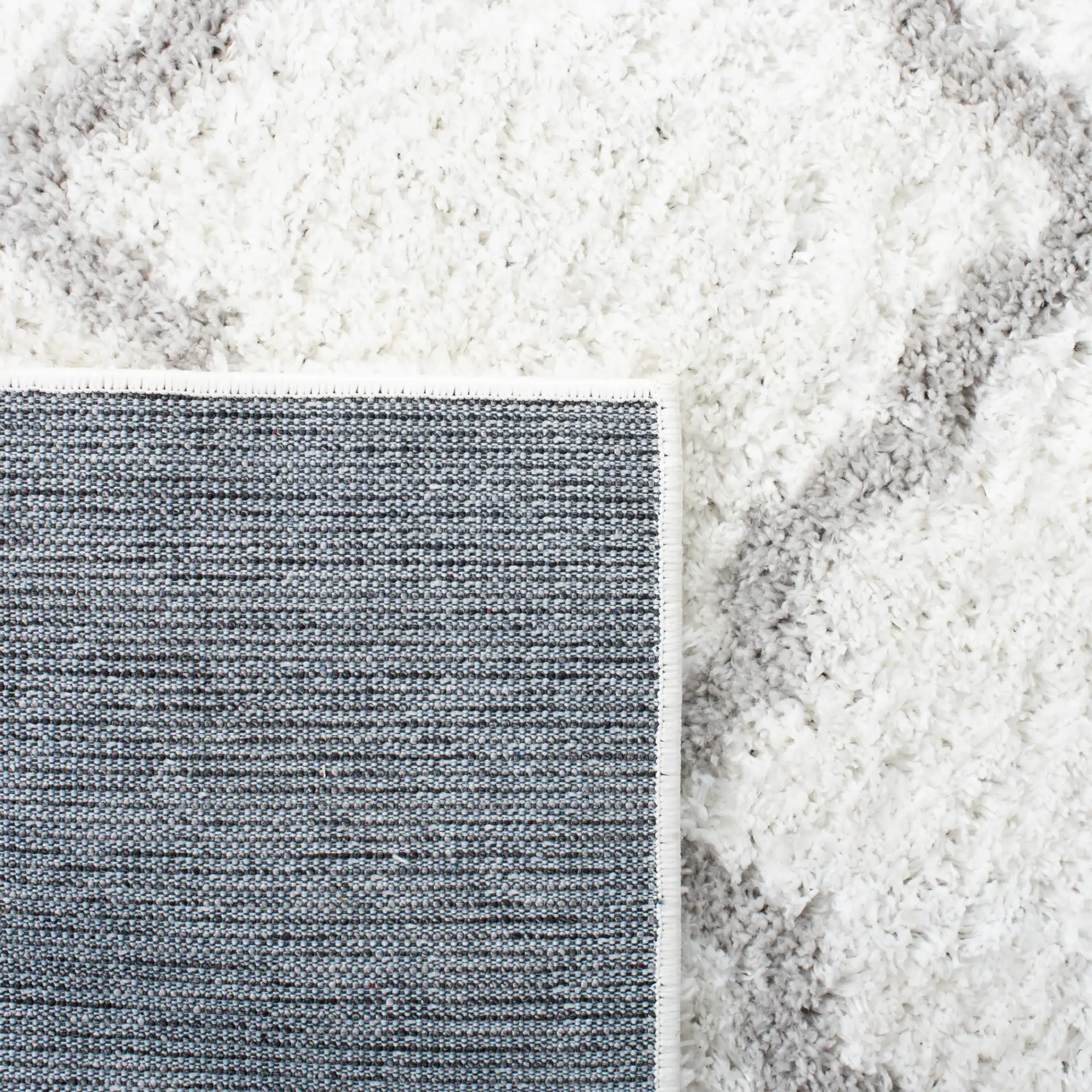 Berber Curved Trellis Shag Rug in Ivory / Light Gray in a styled room