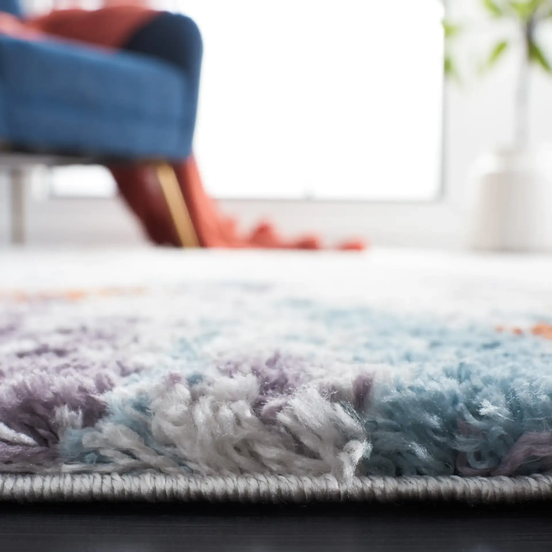 Berber Mottled Shag Rug in Blue Rust / Ivory in a styled room