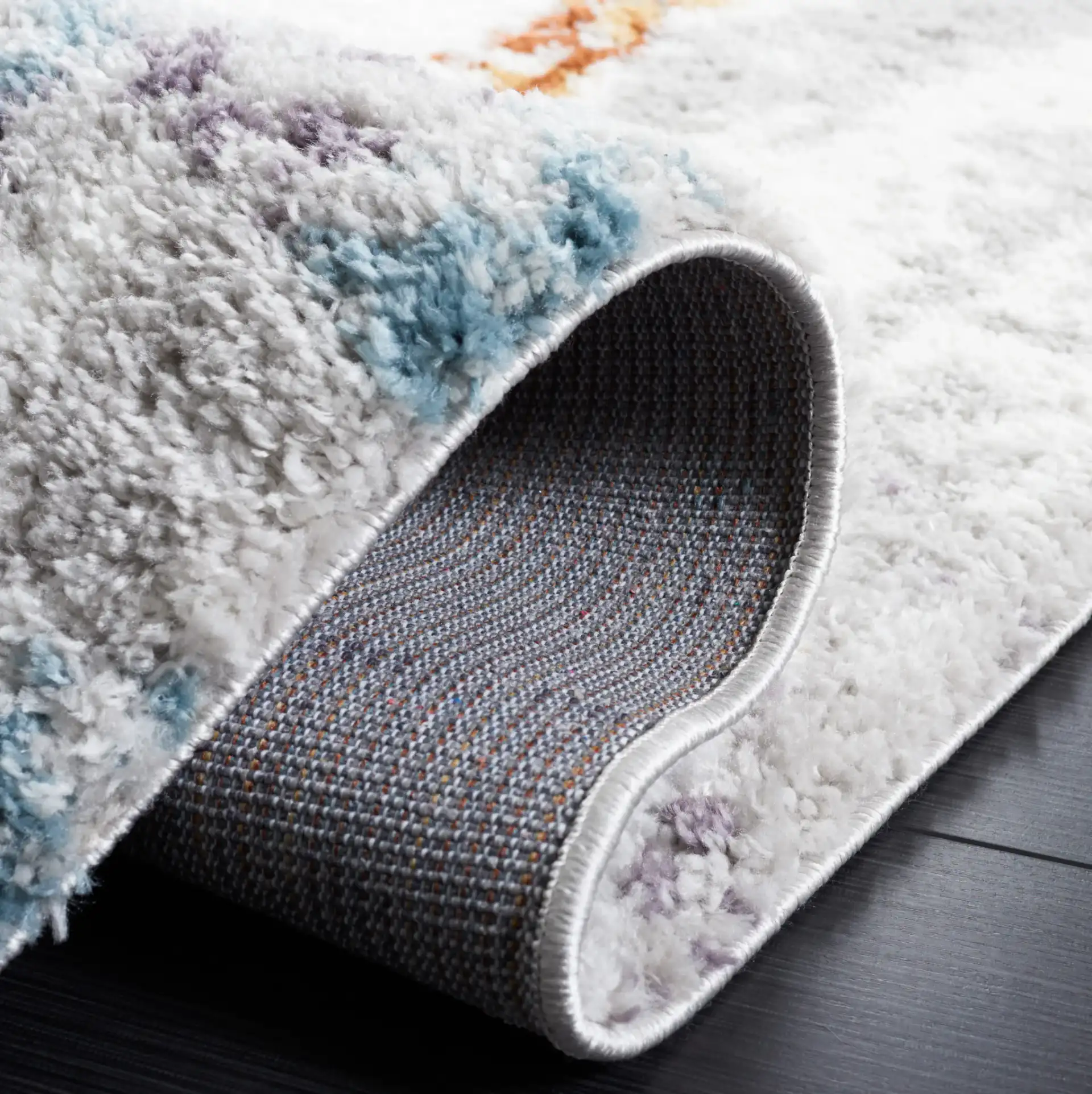Berber Mottled Shag Rug in Blue Rust / Ivory in a styled room