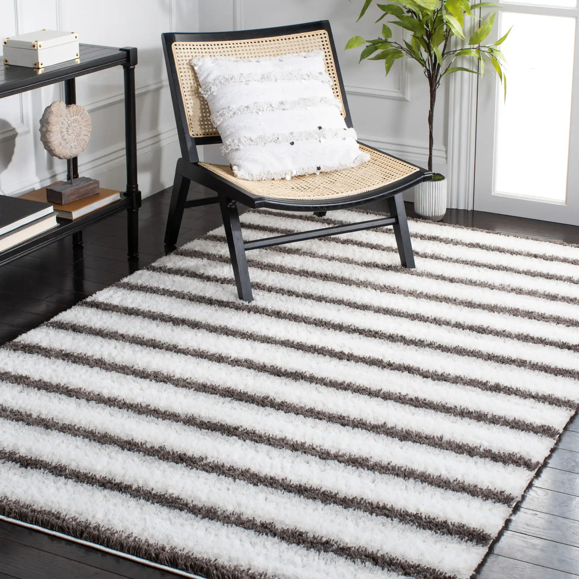 Berber Thin Horizontal Stripe Shag Rug in Ivory / Gray in a styled room