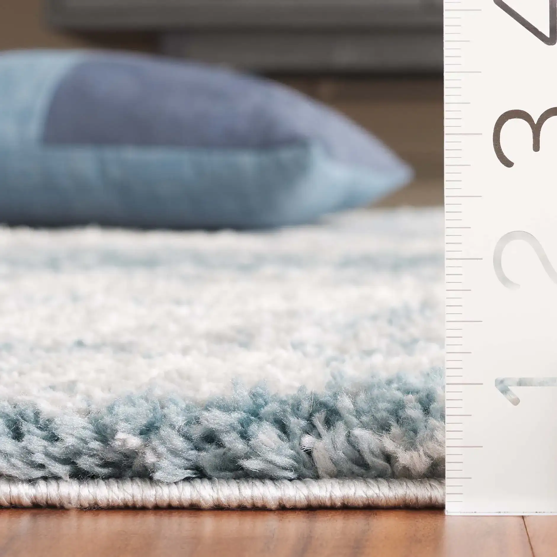 Berber Clouded Abstract Shag Rug in Ivory / Blue in a styled room