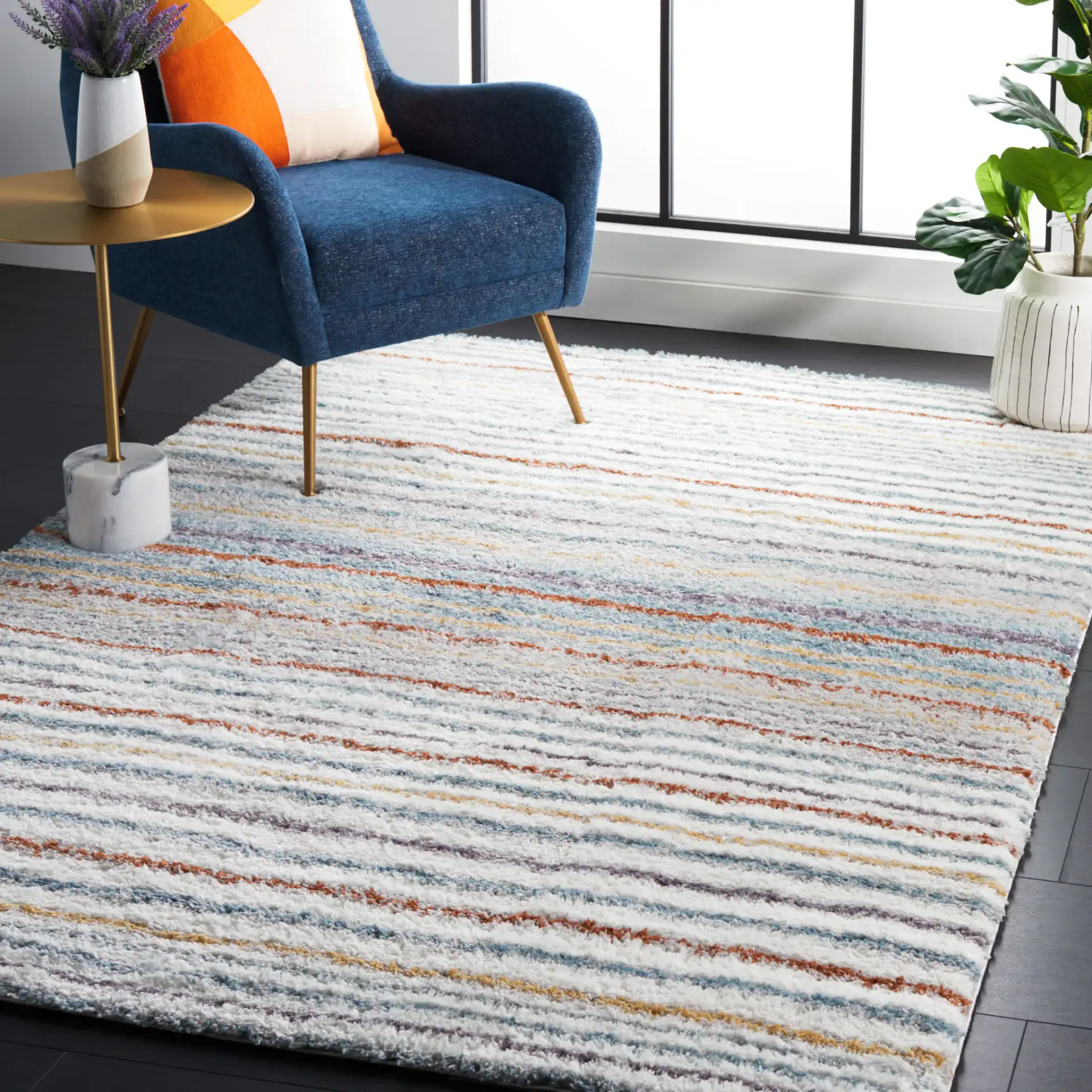Berber Gradient Stripe Shag Rug in Blue Rust / Ivory in a styled room