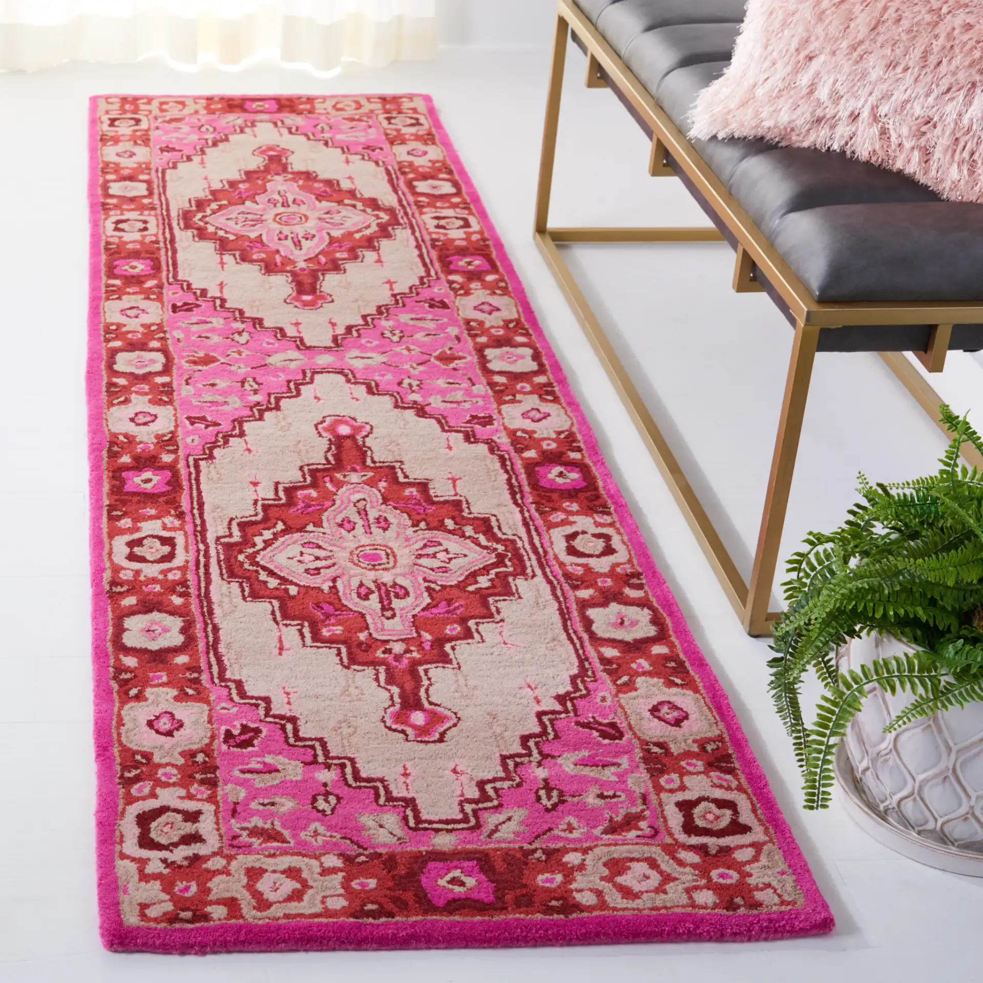 Bellagio Stepped Medallion Hand-Tufted Wool Rug in Red Pink / Ivory in a styled room