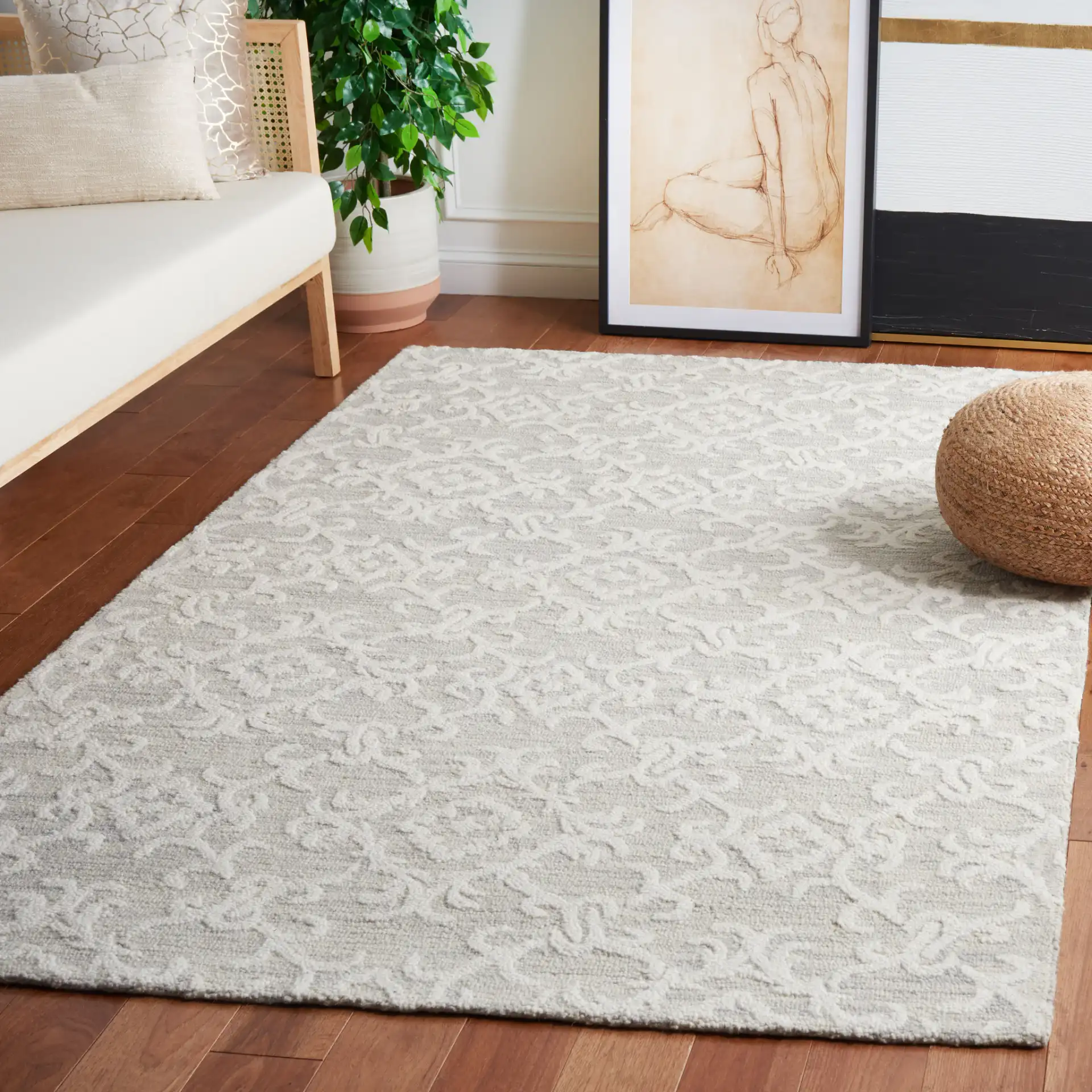 Blossom Scrollwork Hand-Tufted Wool Rug in Gray / Ivory in a styled room