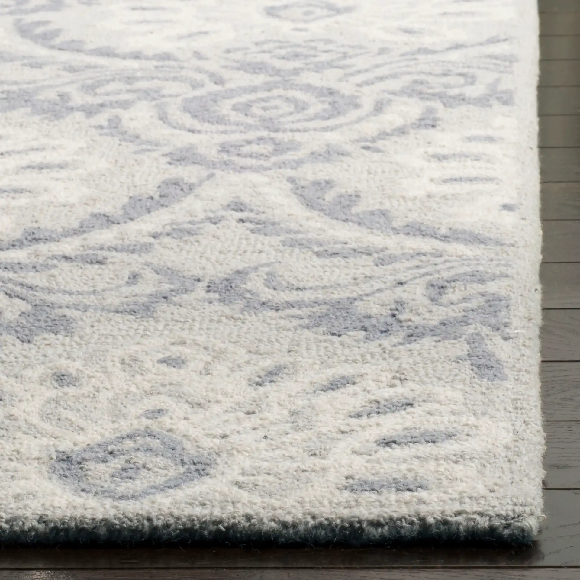 Blossom Palmette Damask Hand-Tufted Wool Rug in Light Gray / Ivory in a styled room