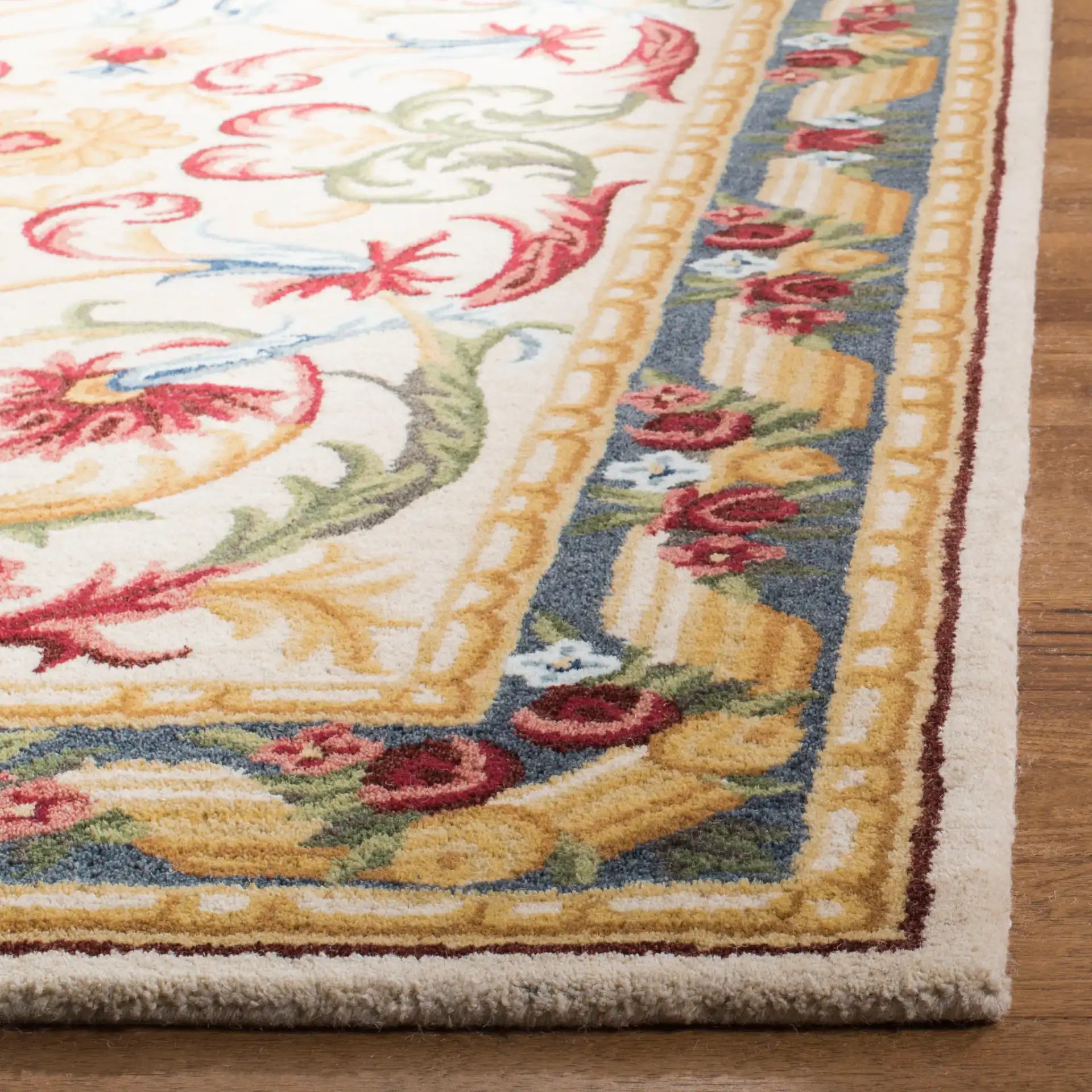 Blossom Acanthus Scroll Hand-Tufted Wool Rug in Ivory / Green in a styled room