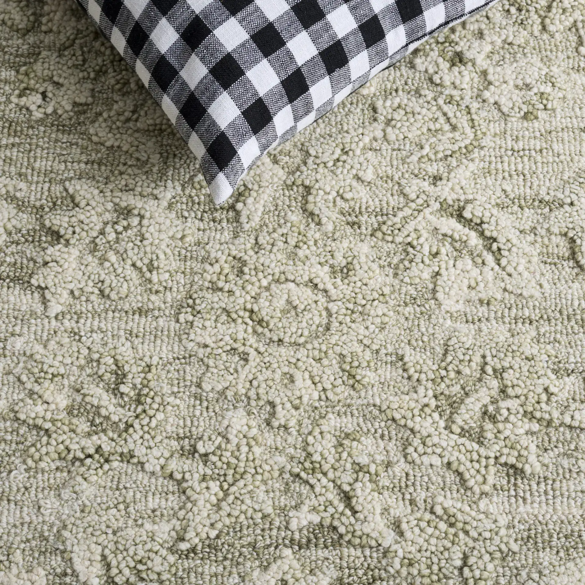 Blossom Damask Vine Hand-Tufted Wool Rug in Sage / Ivory in a styled room