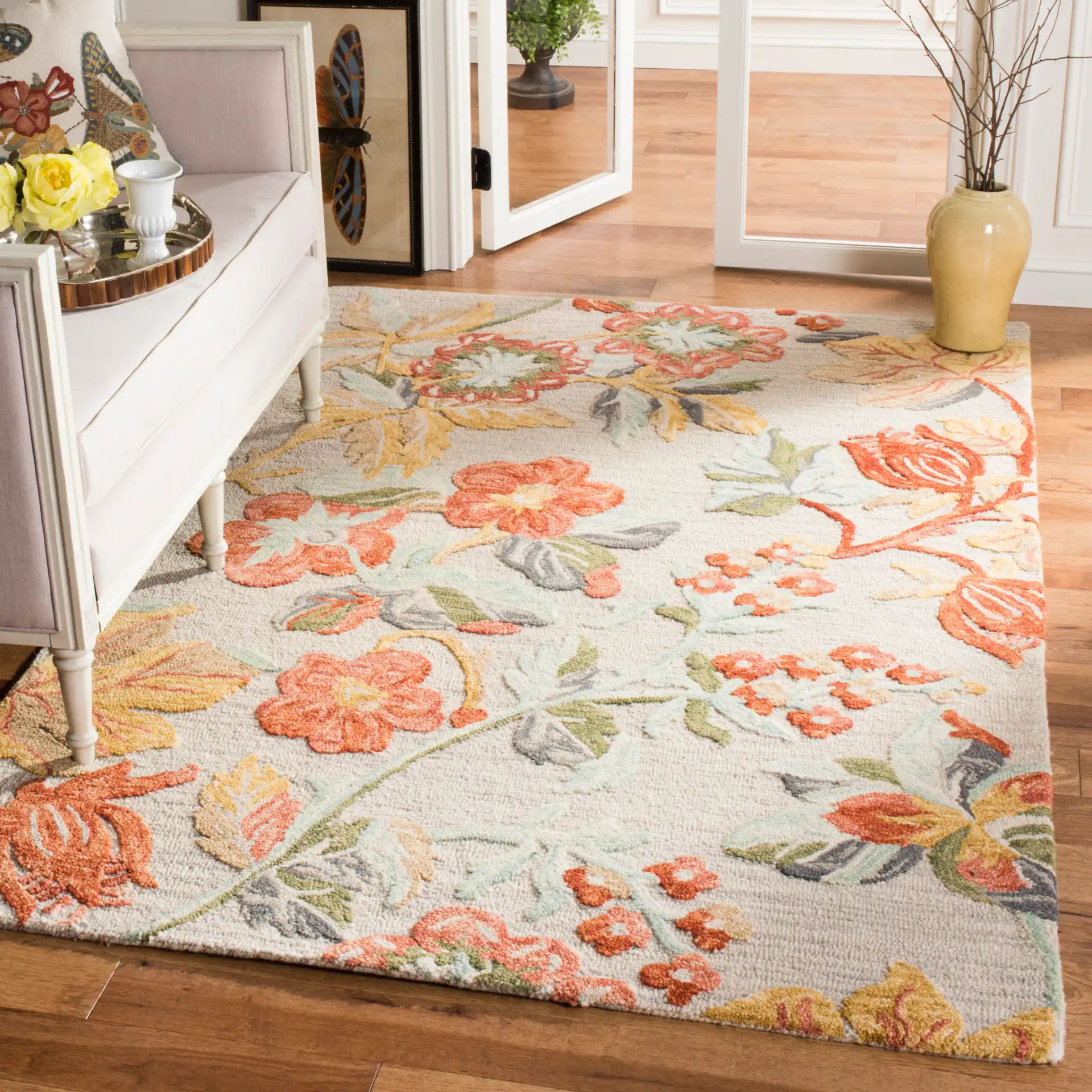 Blossom Floral Branch Hand-Tufted Wool Rug in Gray / Red in a styled room