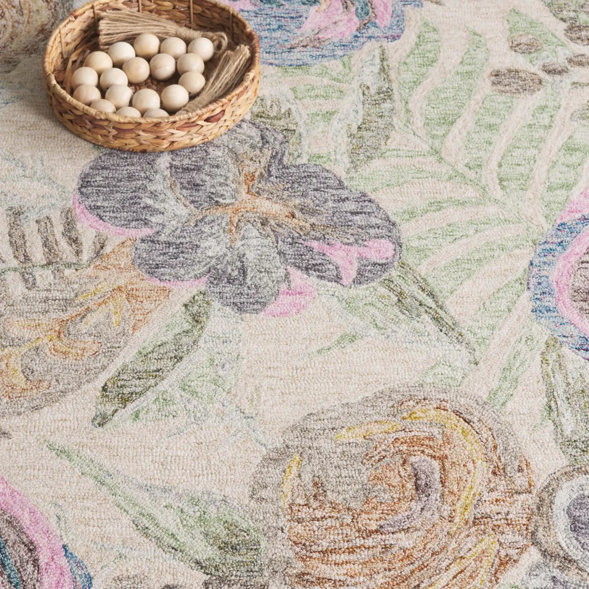 Blossom Scattered Floral Hand-Tufted Wool Rug in Green / Pink in a styled room