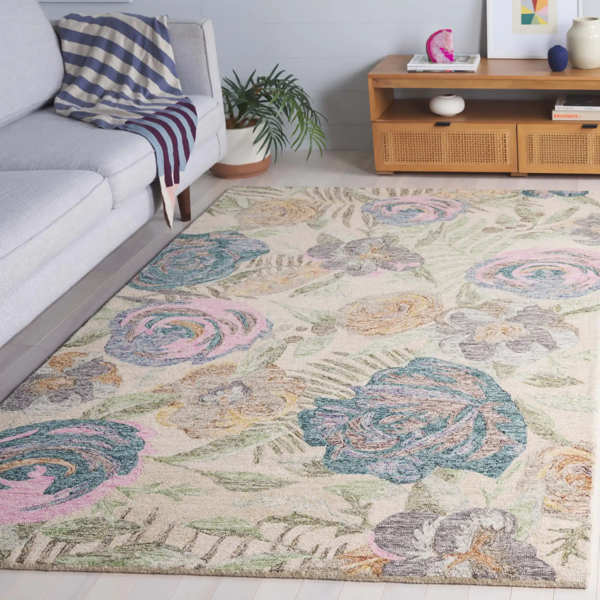 Blossom Scattered Floral Hand-Tufted Wool Rug in Green / Pink in a styled room
