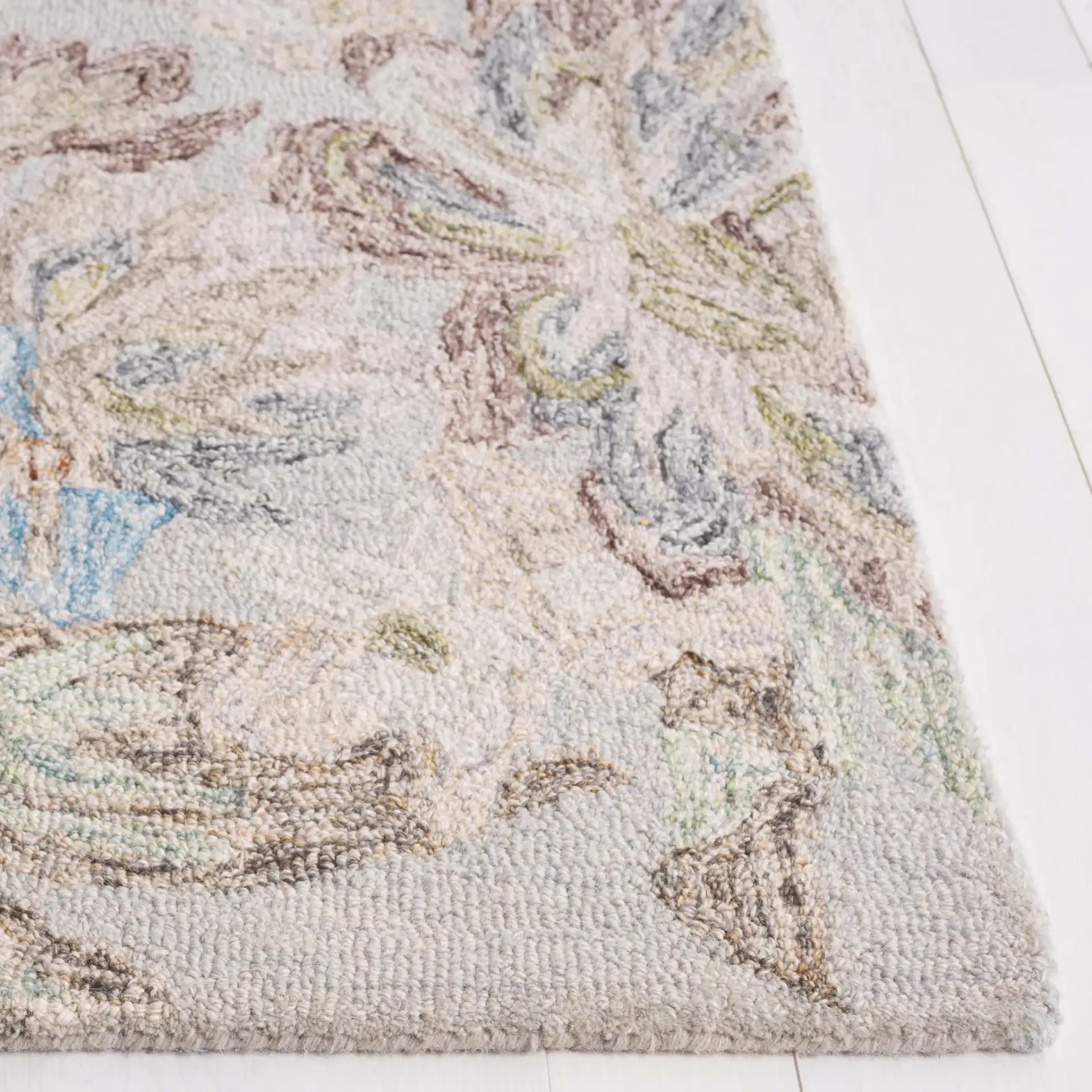 Blossom Pastoral Floral Hand-Tufted Wool Rug in Gray / Blue in a styled room