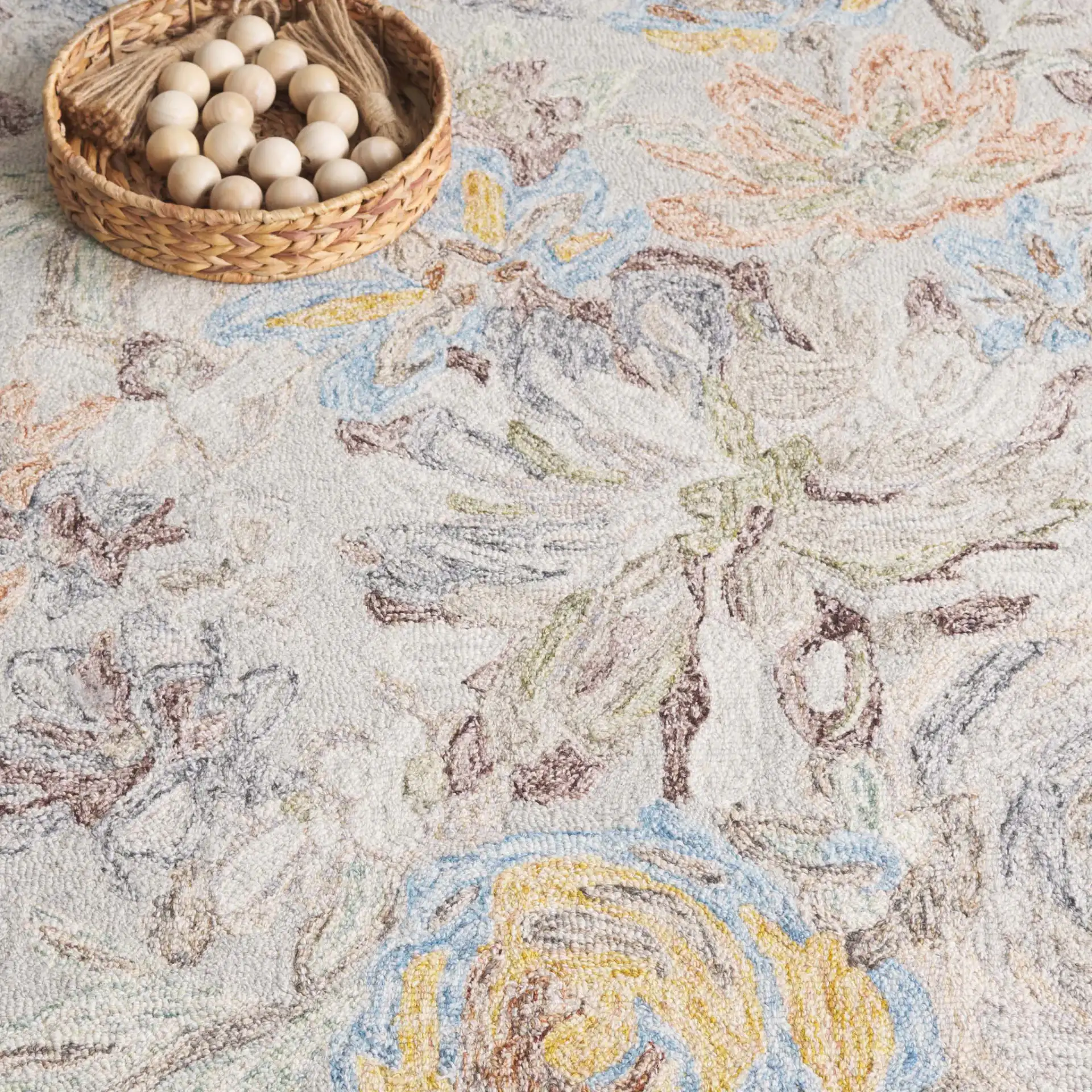 Blossom Pastoral Floral Hand-Tufted Wool Rug in Gray / Blue in a styled room
