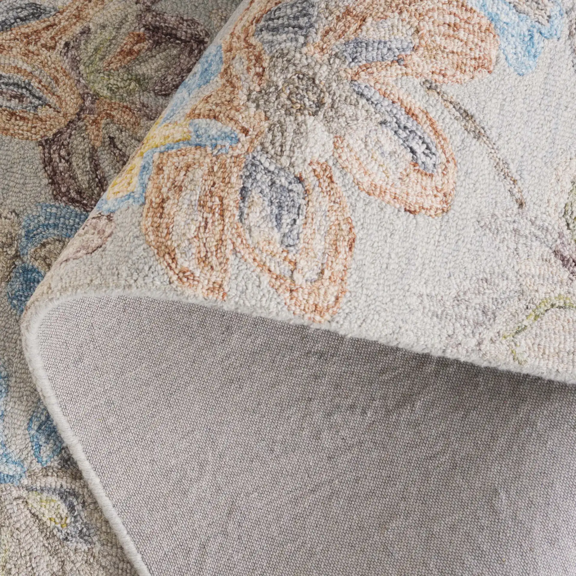 Blossom Pastoral Floral Hand-Tufted Wool Rug in Gray / Blue in a styled room