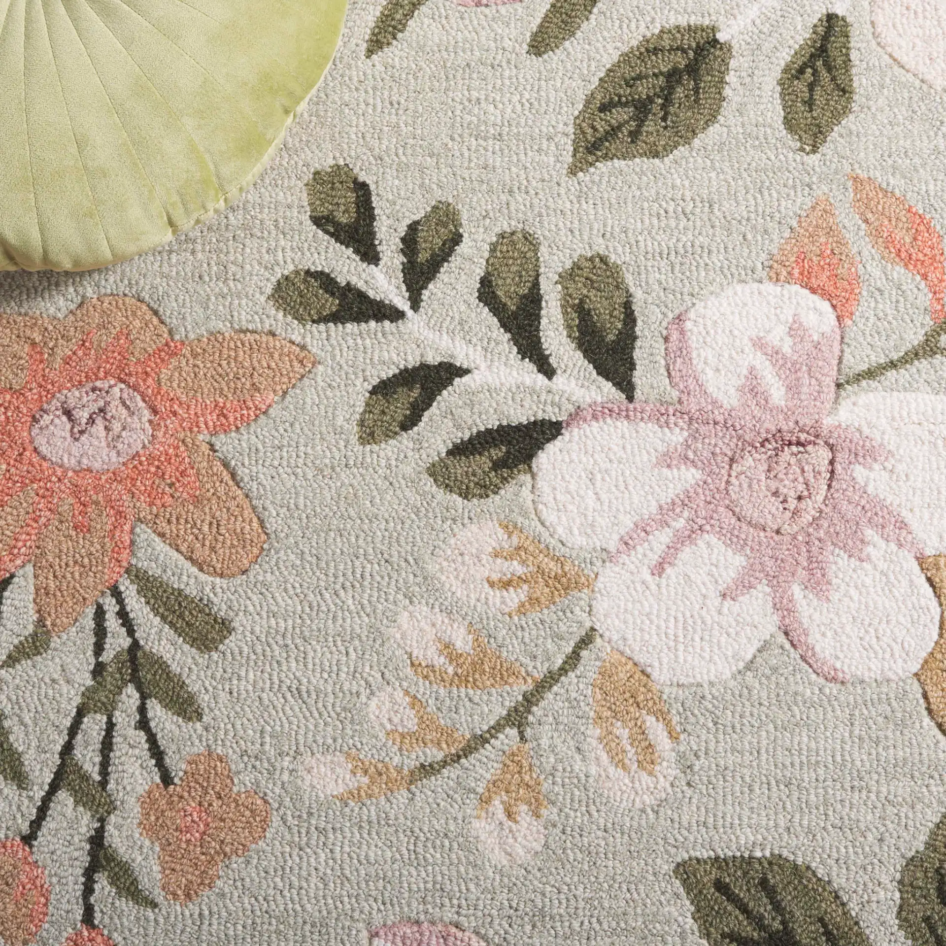 Blossom Floral Sprig Hand-Tufted Wool Rug in Sage / Ivory in a styled room