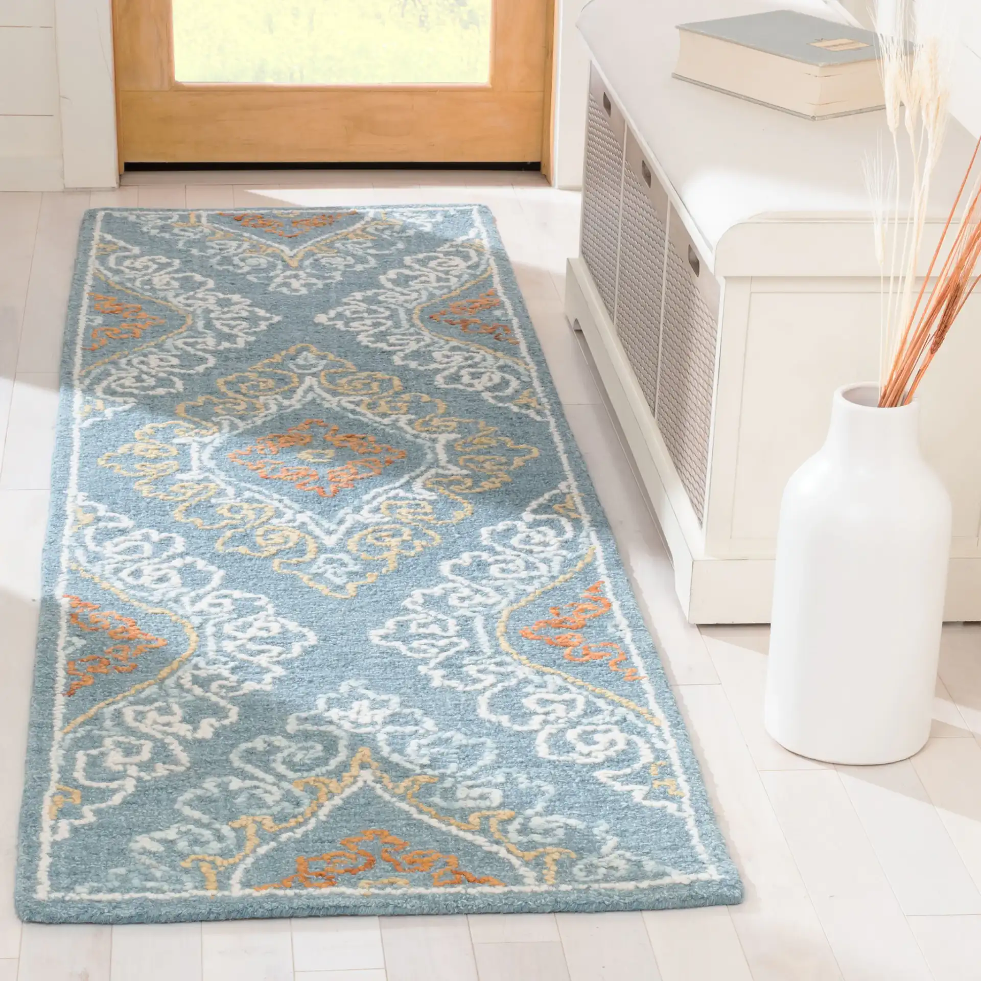 Blossom Damask Diamond Hand-Tufted Wool Rug in Blue / Yellow in a styled room