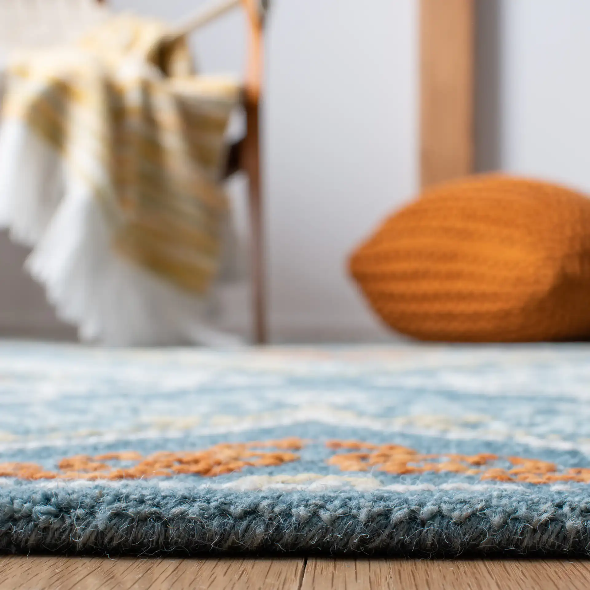 Blossom Damask Diamond Hand-Tufted Wool Rug in Blue / Yellow in a styled room
