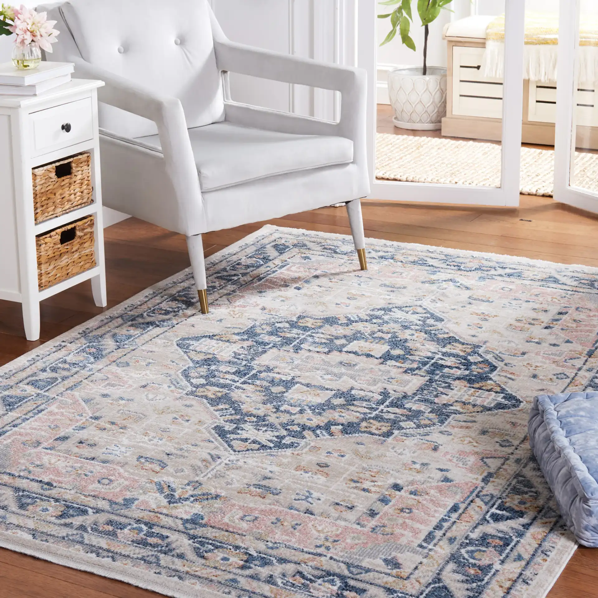 Blair Medallion Border Washable Rug in Beige / Navy in a styled room