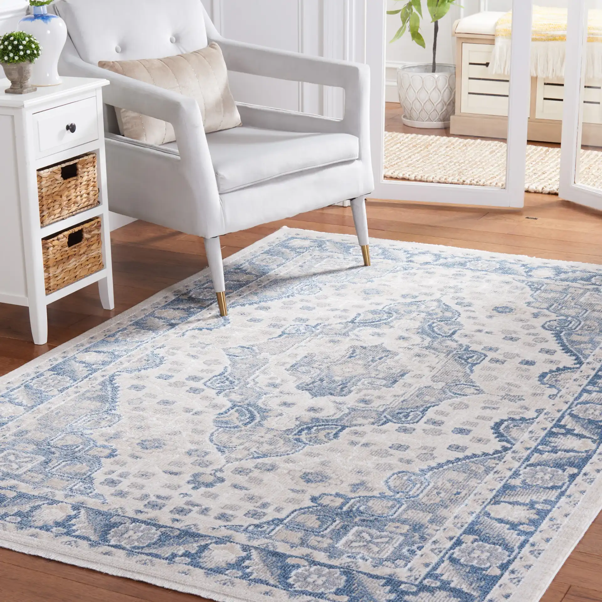 Blair Washable Medallion Bordered Rug in Beige / Gray Blue in a styled room