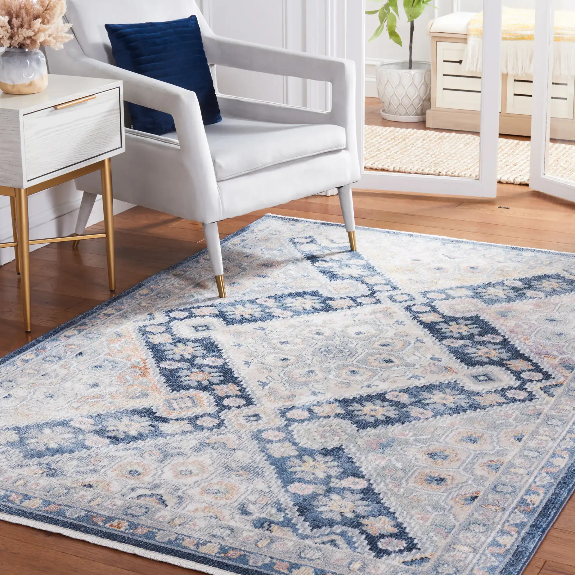 Blair Geometric Diamond Medallion Washable Rug in Gray / Navy in a styled room