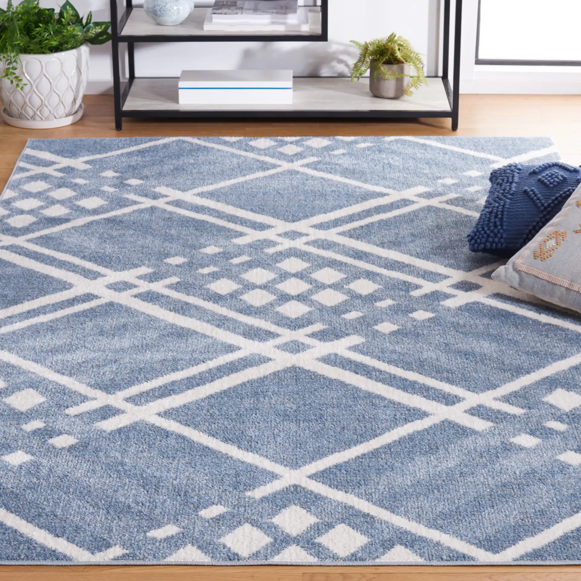 Blair Diamond Lattice Washable Rug in Blue / Ivory in a styled room