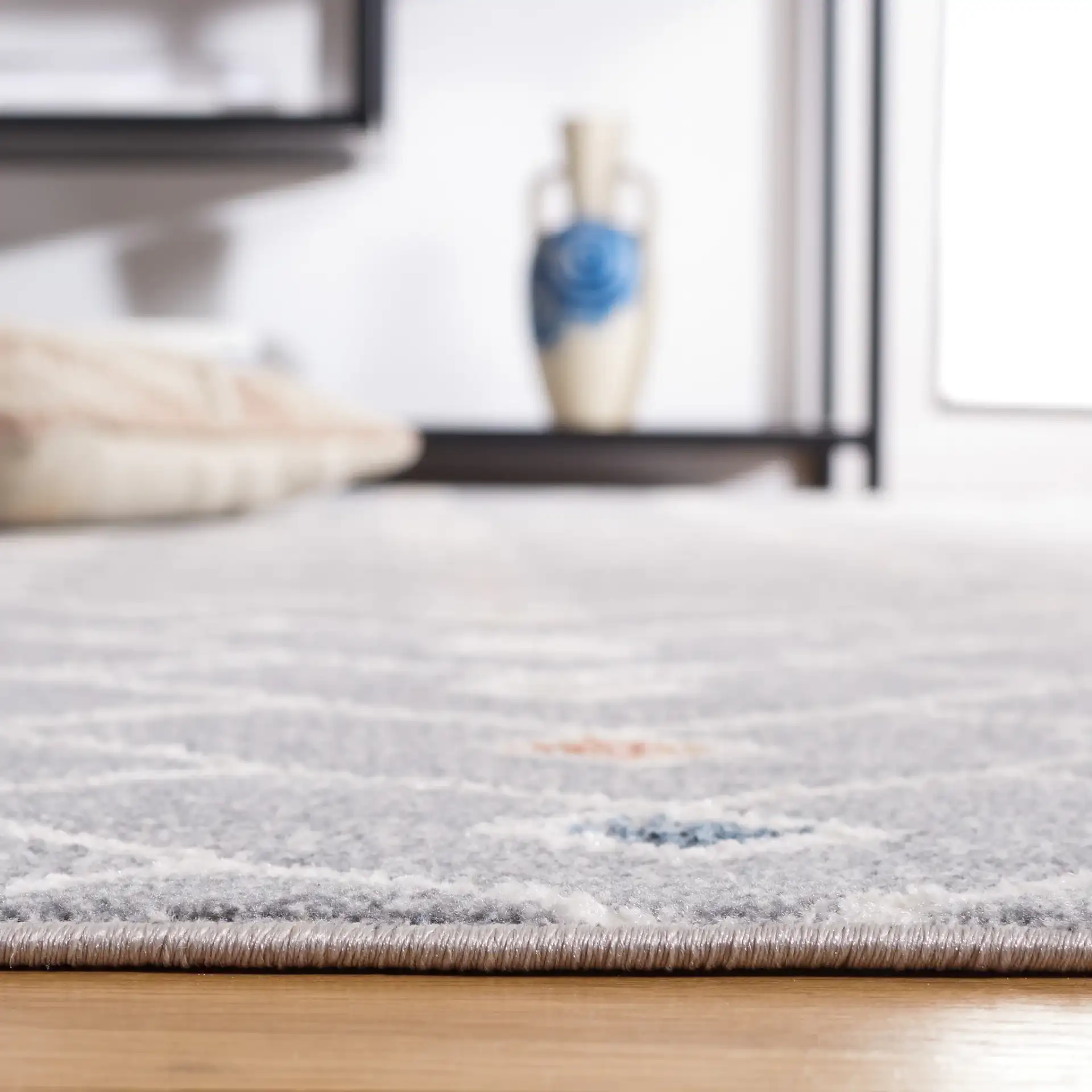Blair Chevron Lattice Washable Rug in Gray / Multicolor in a styled room