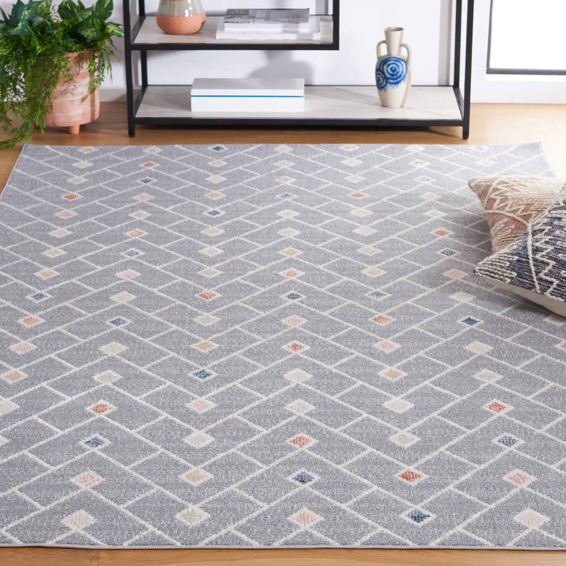 Blair Chevron Lattice Washable Rug in Gray / Multicolor in a styled room