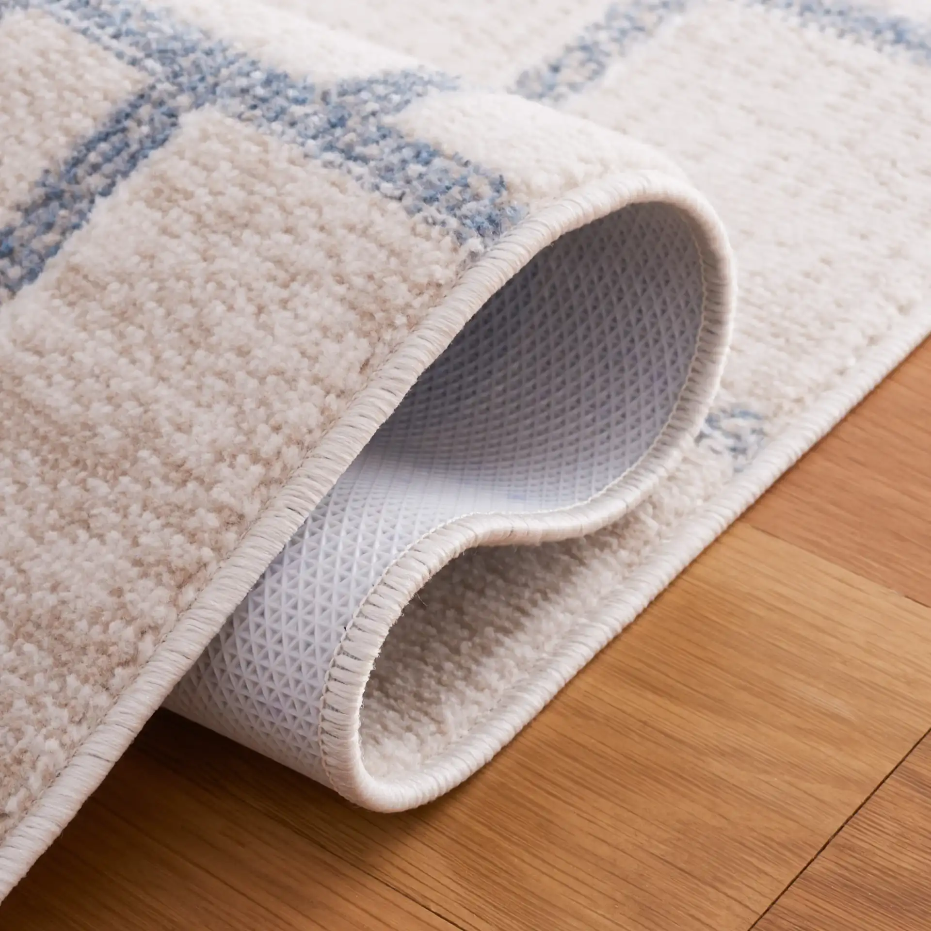 Blair Washable Intersecting Square Rug in Beige / Gray in a styled room