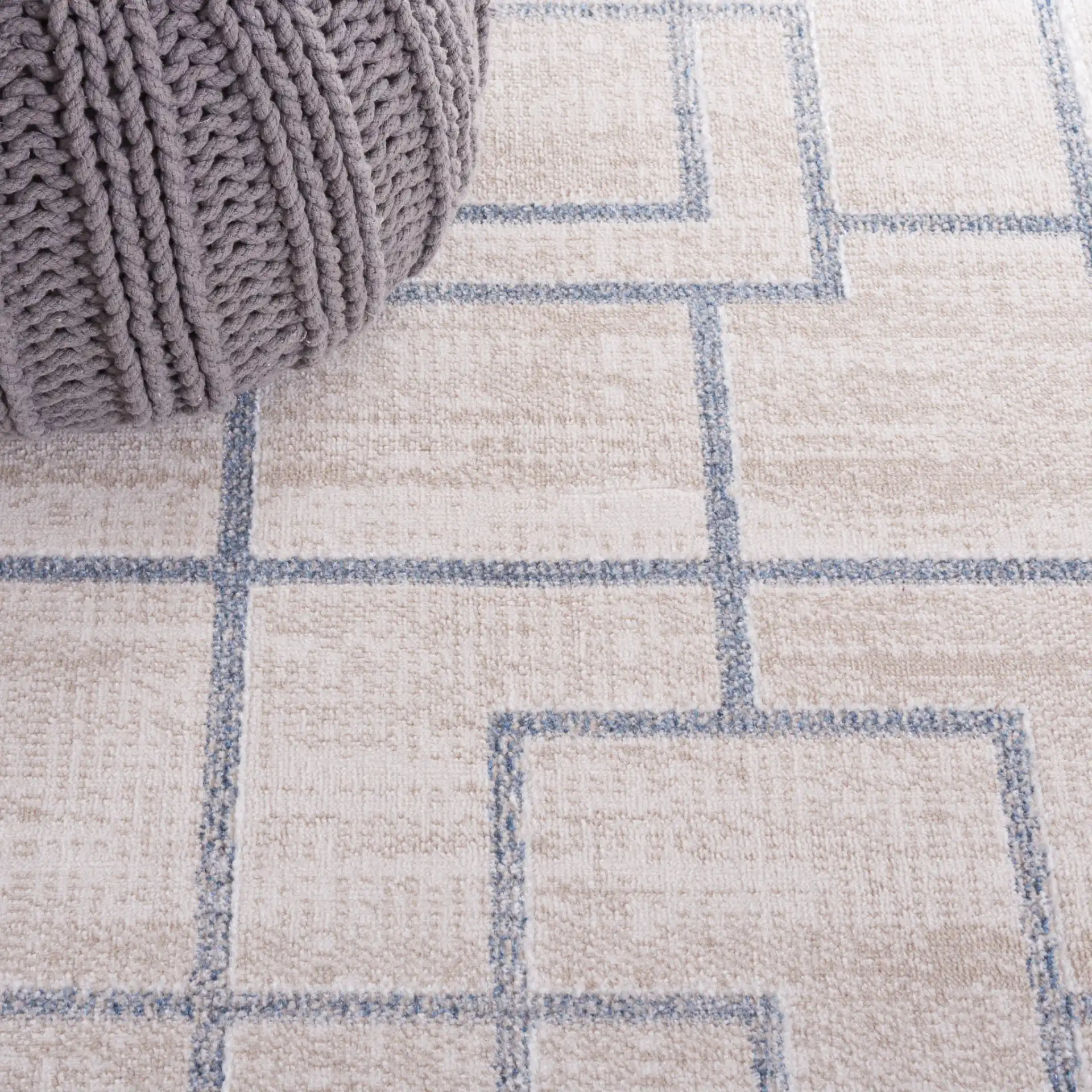 Blair Washable Intersecting Square Rug in Beige / Gray in a styled room