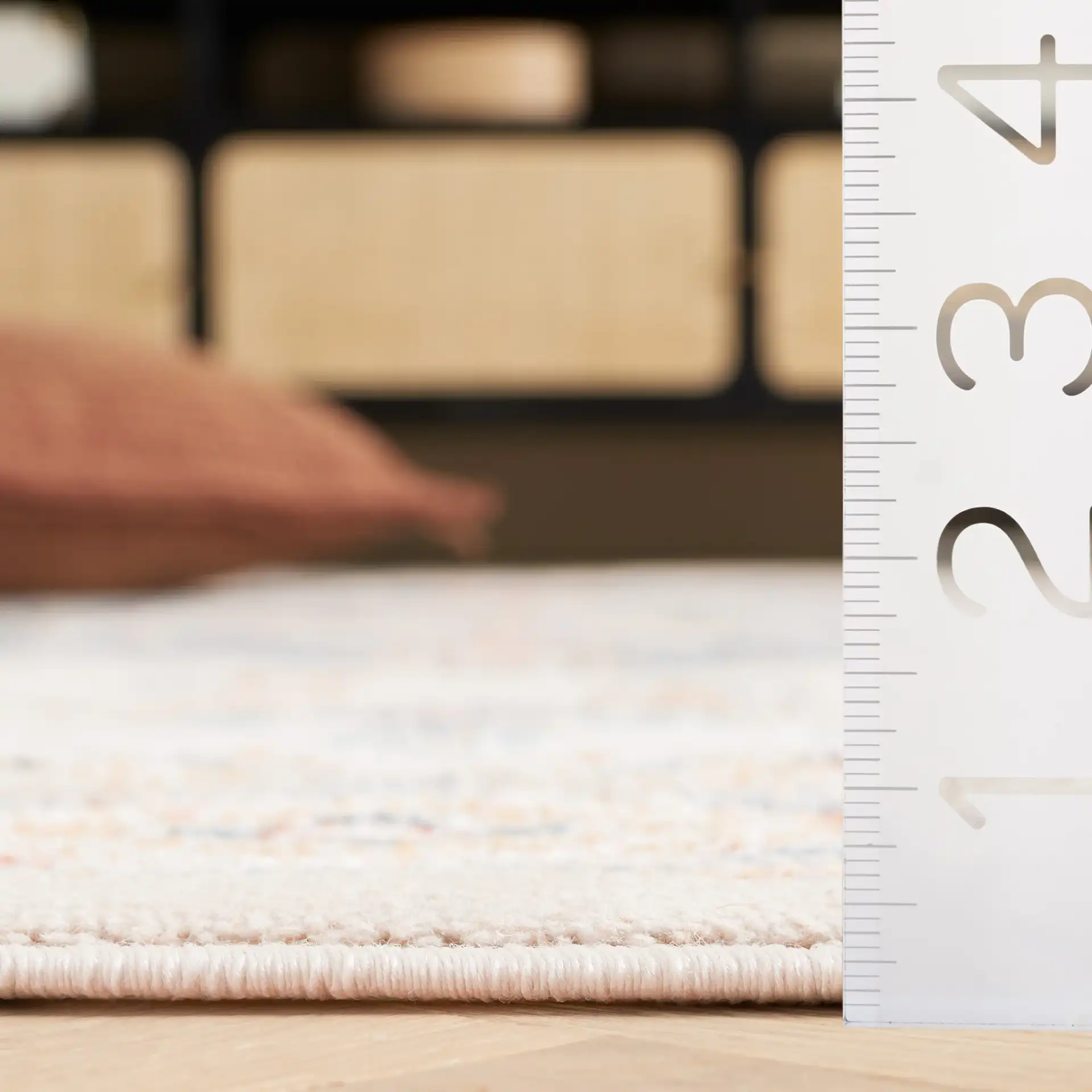 Blair Tribal Medallion Washable Rug in Ivory / Blue in a styled room