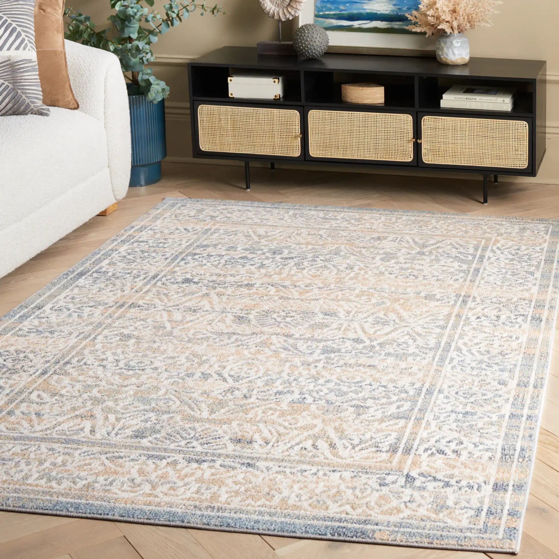 Blair Bordered Floral Washable Rug in Ivory / Blue in a styled room