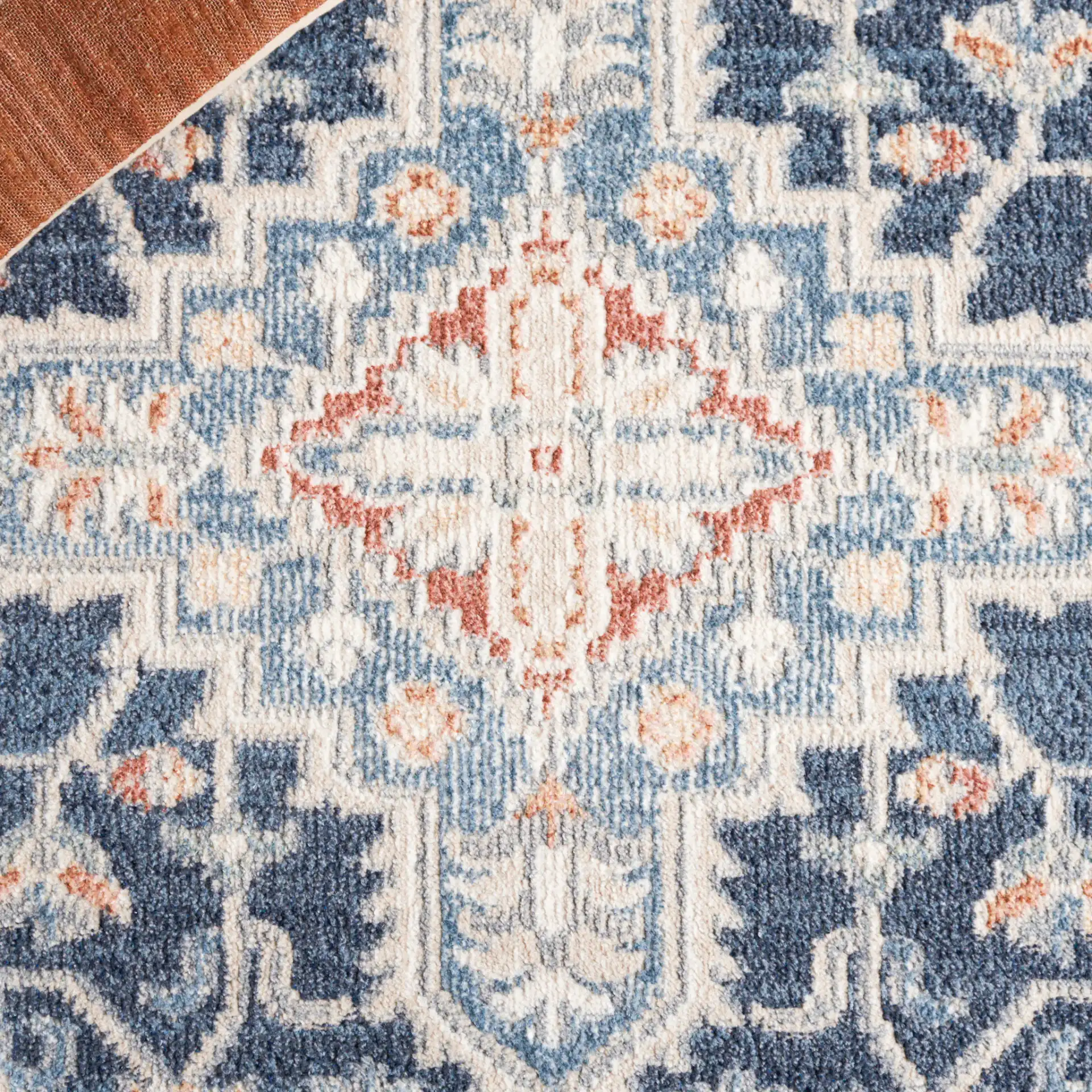 Blair Floral Medallion Washable Rug in Navy / Blue in a styled room