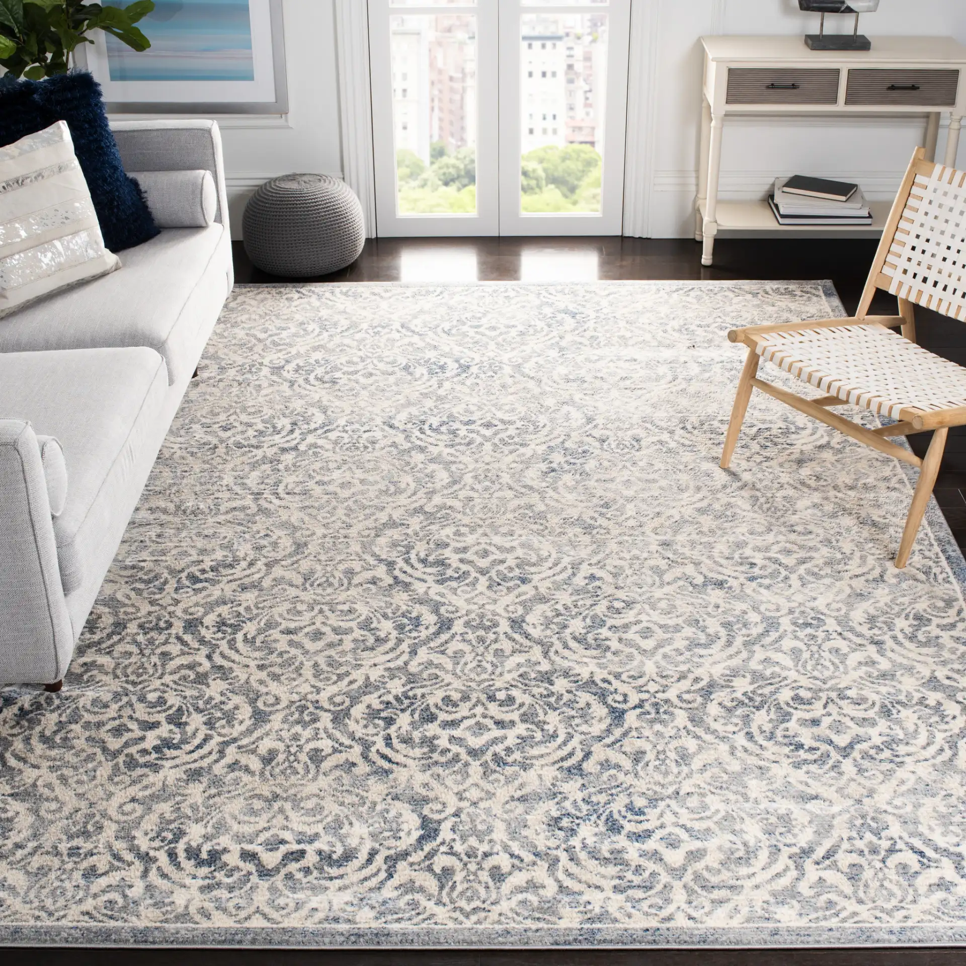 Brentwood Scroll Rug in Light Gray / Blue in a styled room