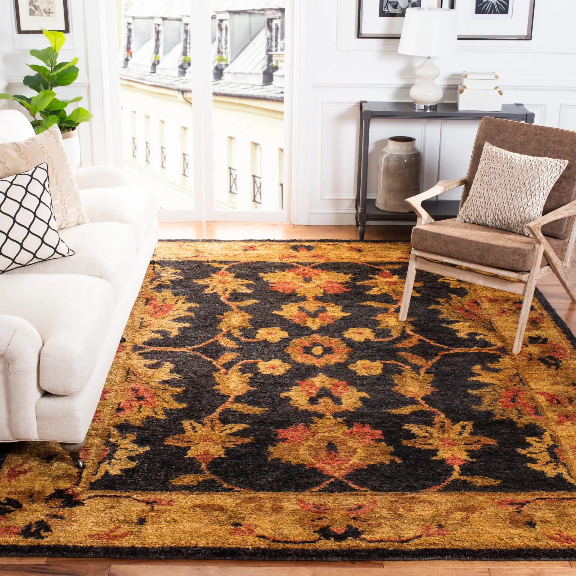 Bohemian Vine And Blossom Hand-Tufted Rug in Charcoal / Gold in a styled room