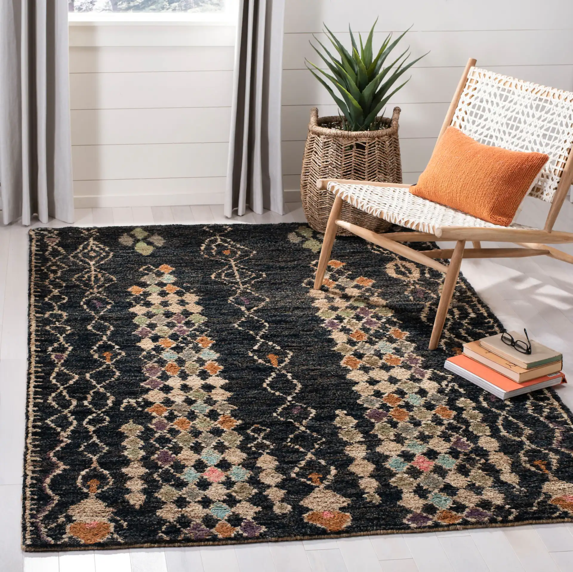 Bohemian Diamond Column Hand-Knotted Jute Rug in Black / Beige in a styled room