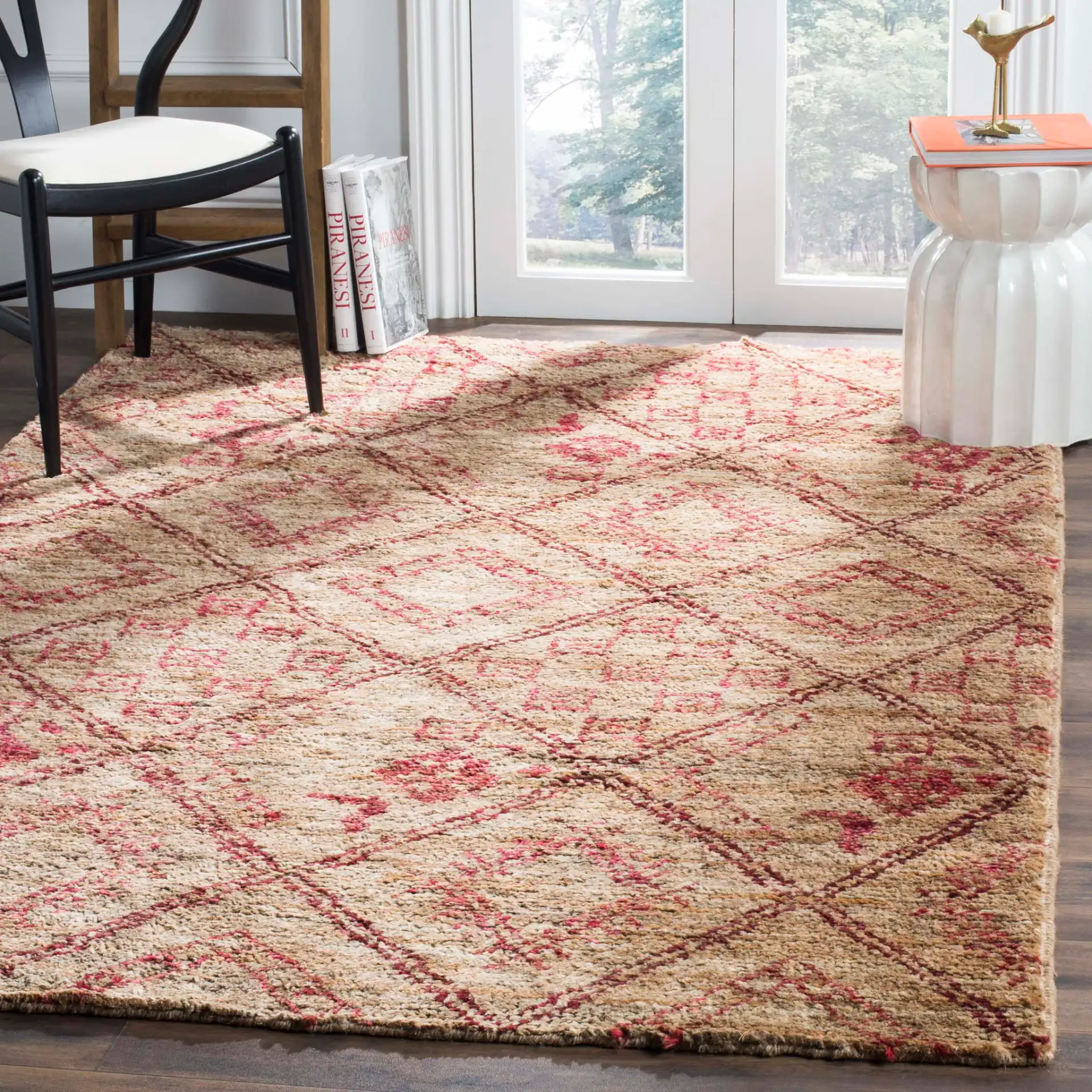 Bohemian Tribal Diamond Trellis Hand-Knotted Jute Rug in Natural / Red in a styled room