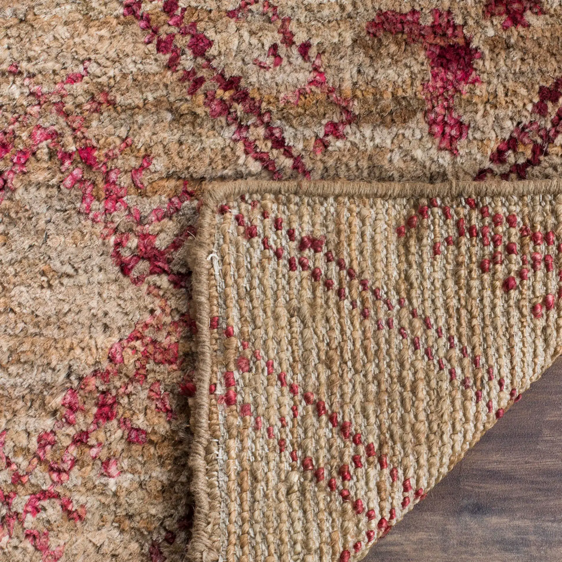Bohemian Tribal Diamond Trellis Hand-Knotted Jute Rug in Natural / Red in a styled room