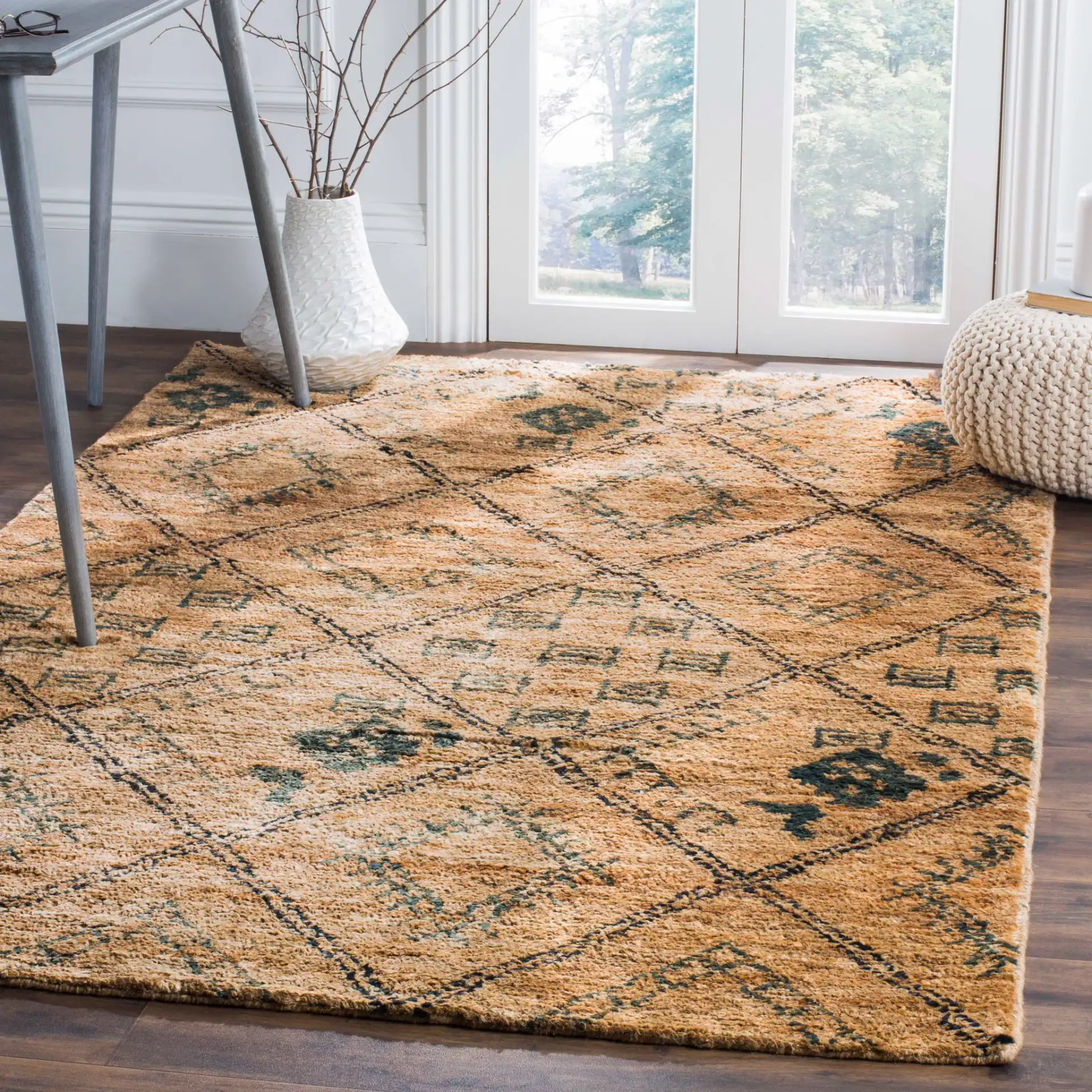 Bohemian Diamond Lattice Hand-Knotted Rug in Natural / Deep Teal in a styled room