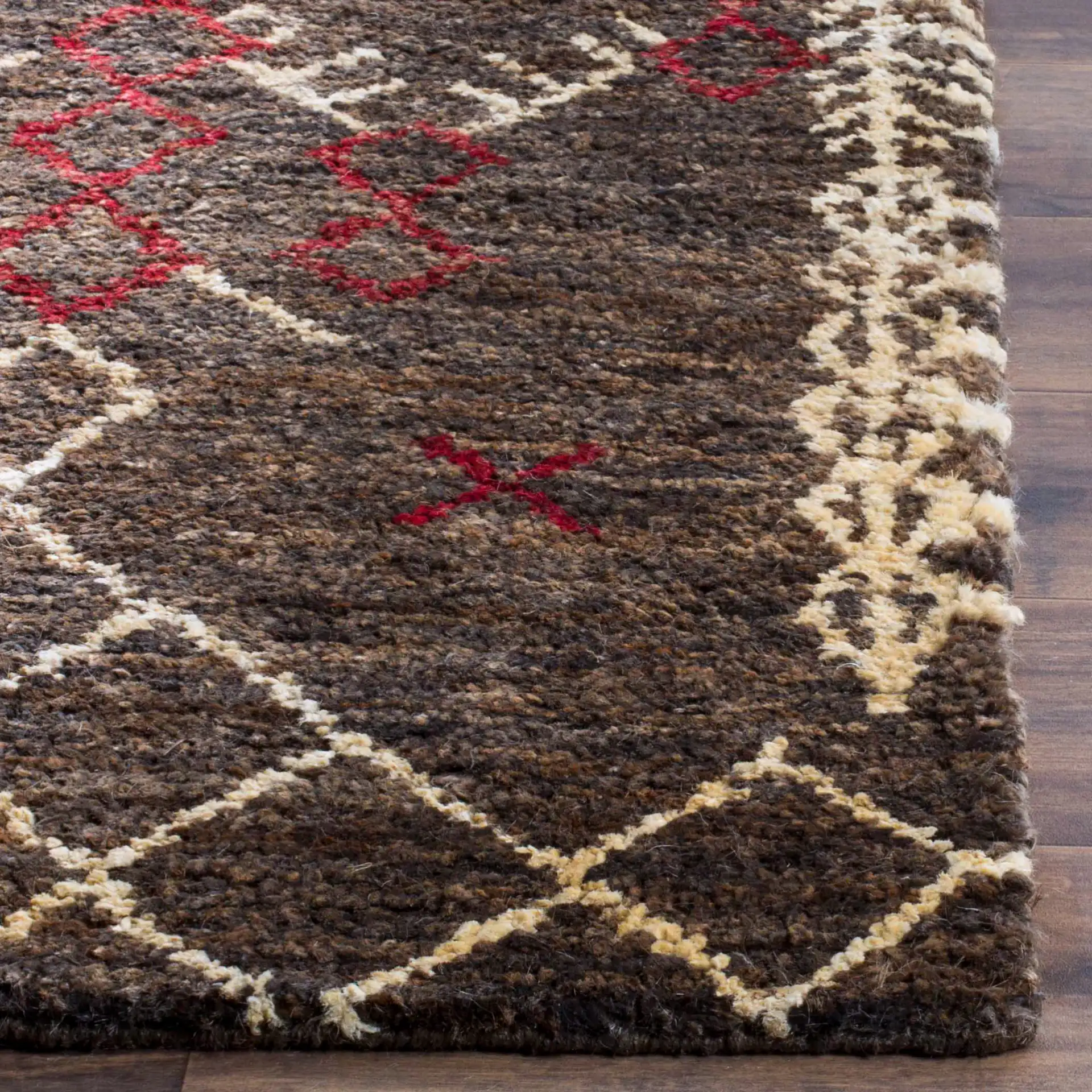 Bohemian Tribal Chevron Hand-Knotted Rug in Dark Brown / Multicolor in a styled room
