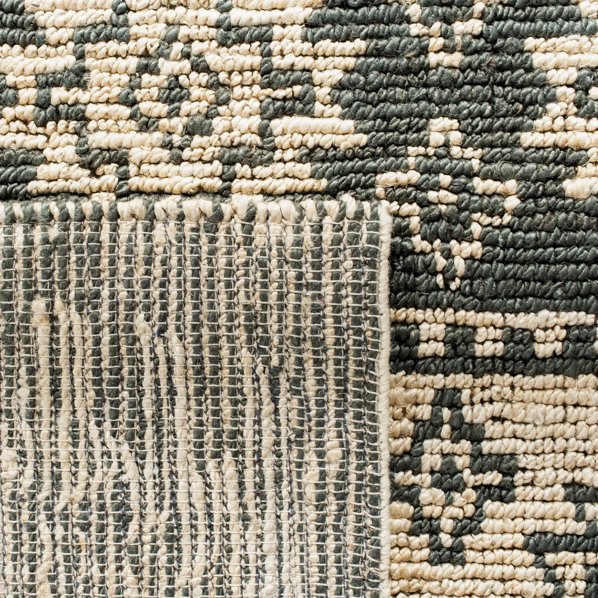 Bohemian Stepped Diamond Hand-Woven Jute Rug in Gray / Beige in a styled room
