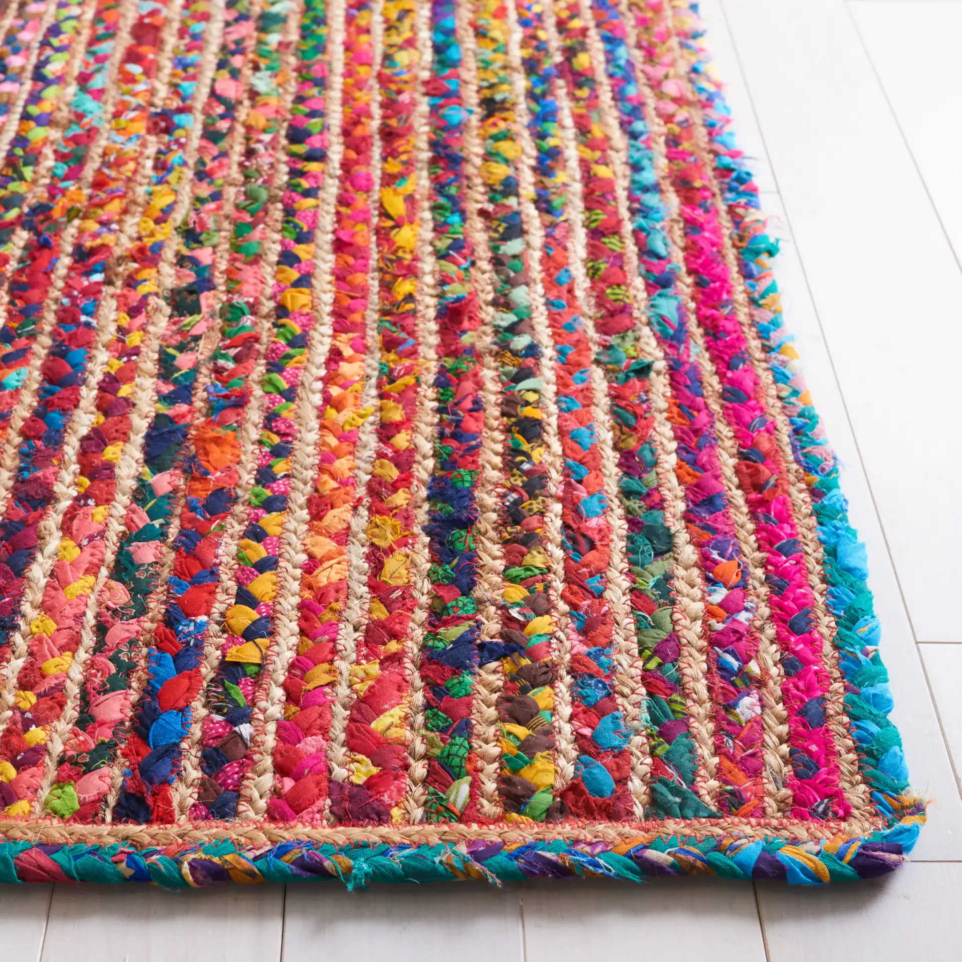 Braided Coastal Striped Jute Rug in Natural / Multicolor in a styled room