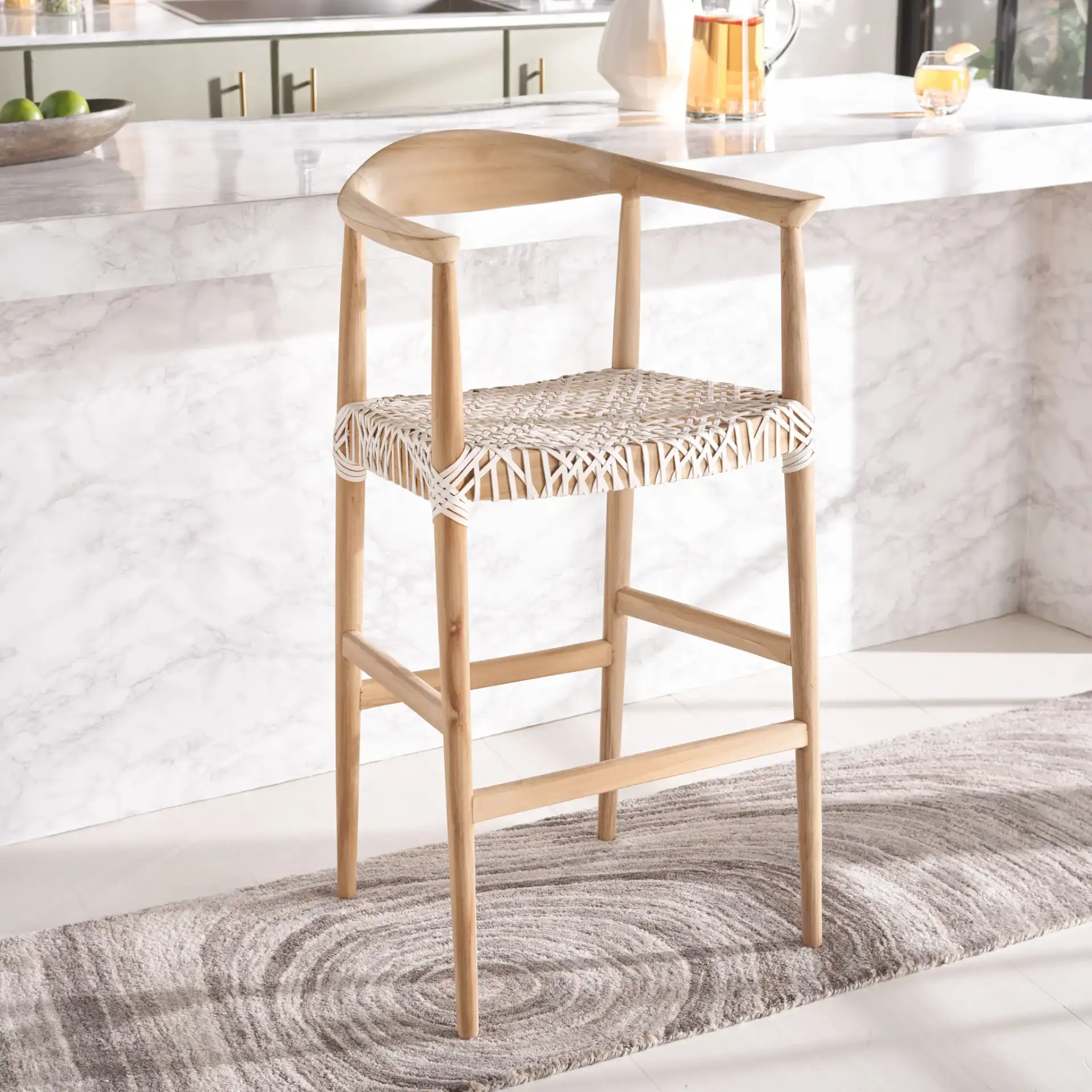 Bandelier Barstool in Natural / White in a styled room