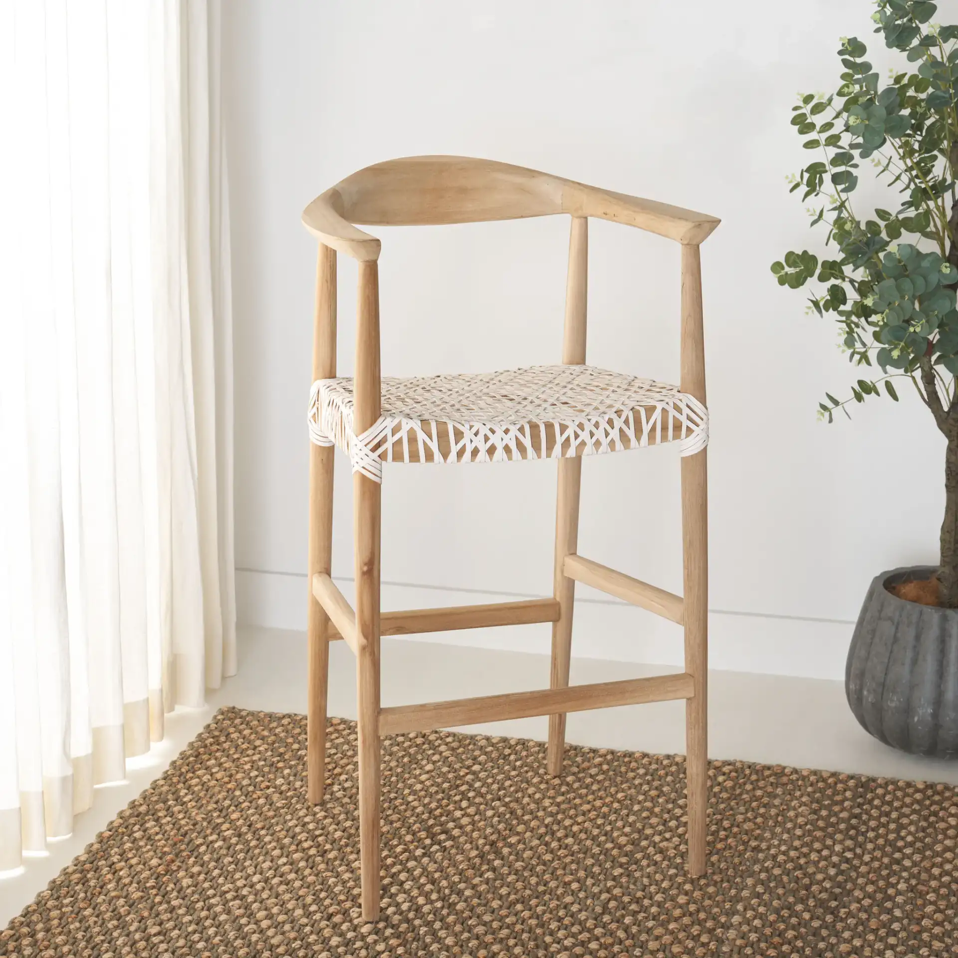 Bandelier Barstool in Natural / White in a styled room