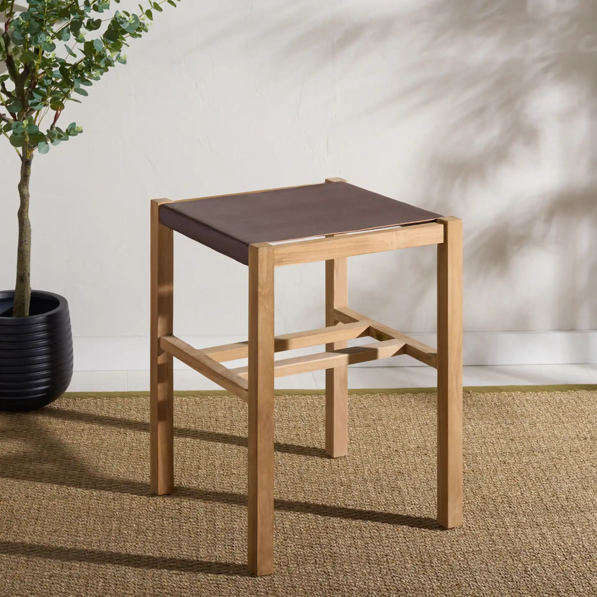 Solana Counter Stool in Cognac / Natural in a styled room