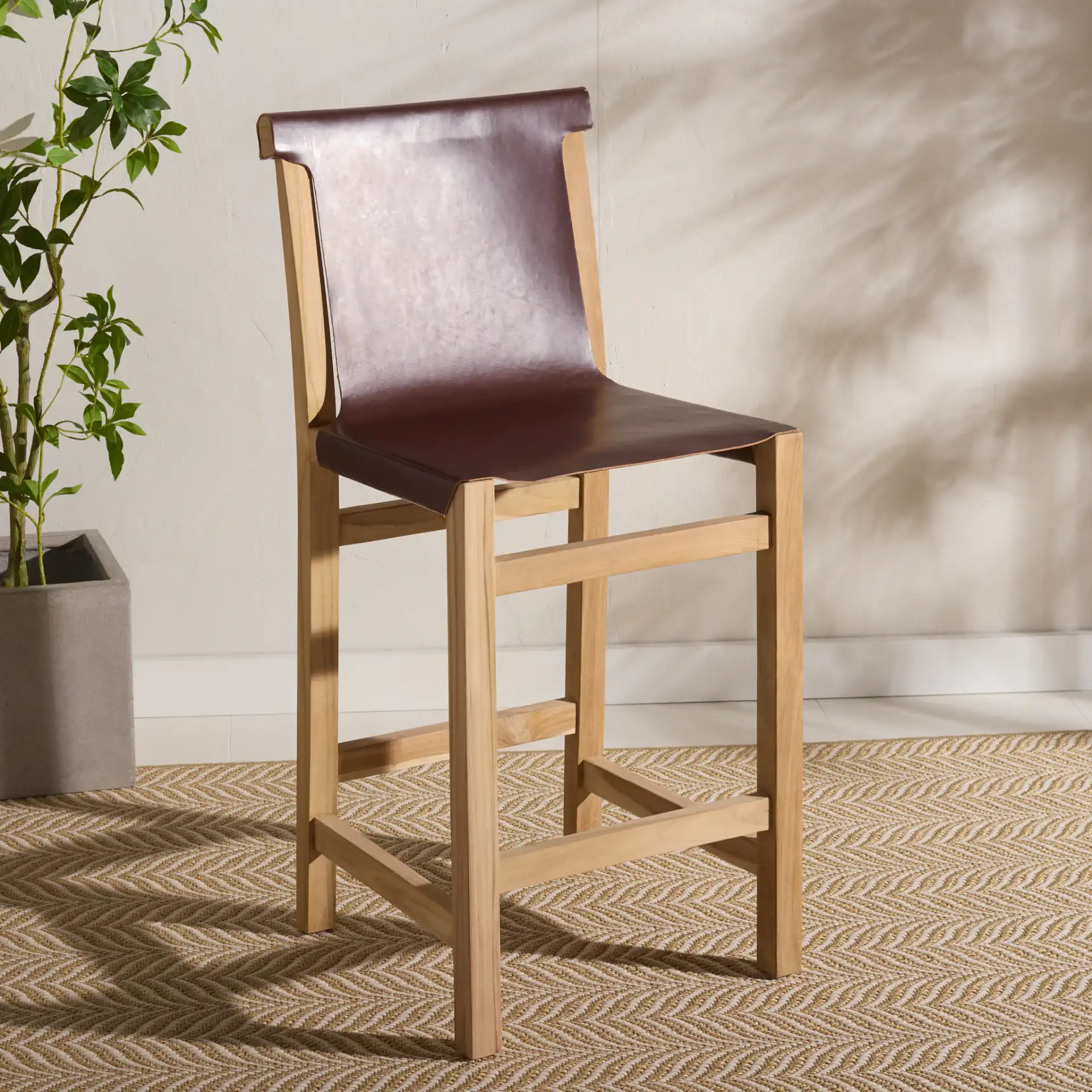 Arian Counter Stool in Cognac / Natural in a styled room