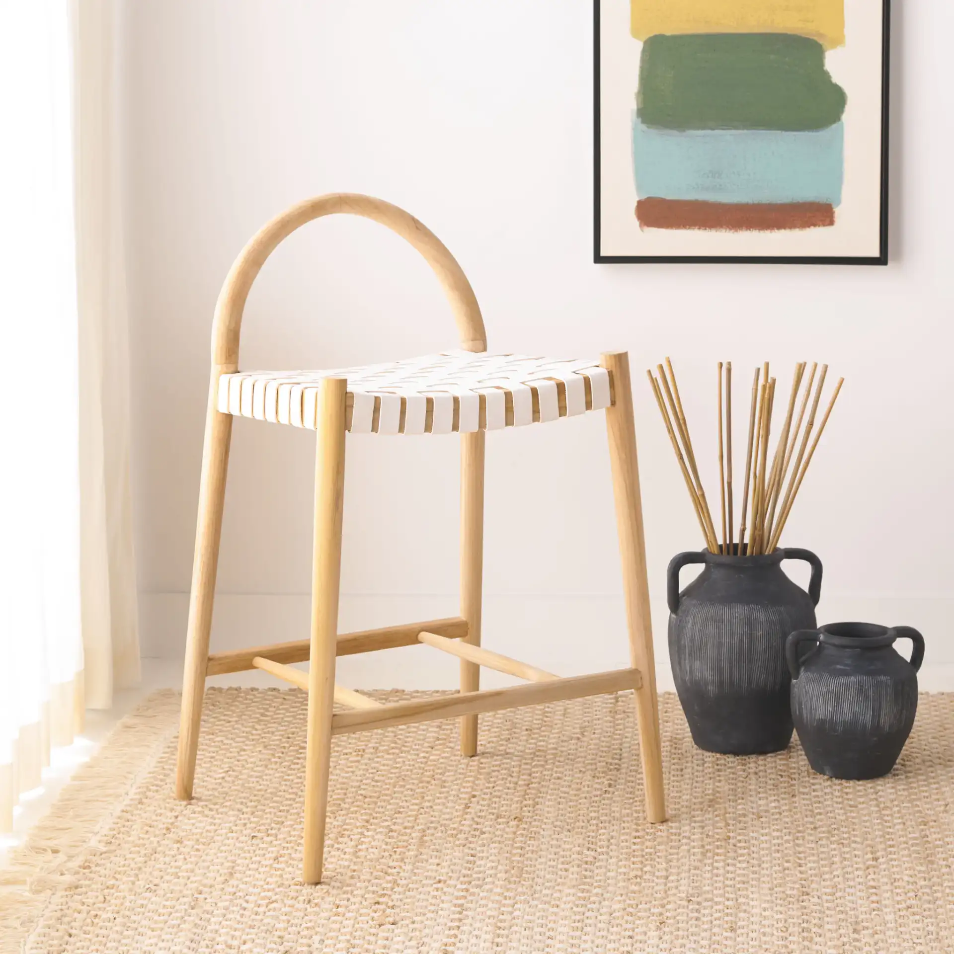 Rhyan Counter Stool in White / Natural in a styled room