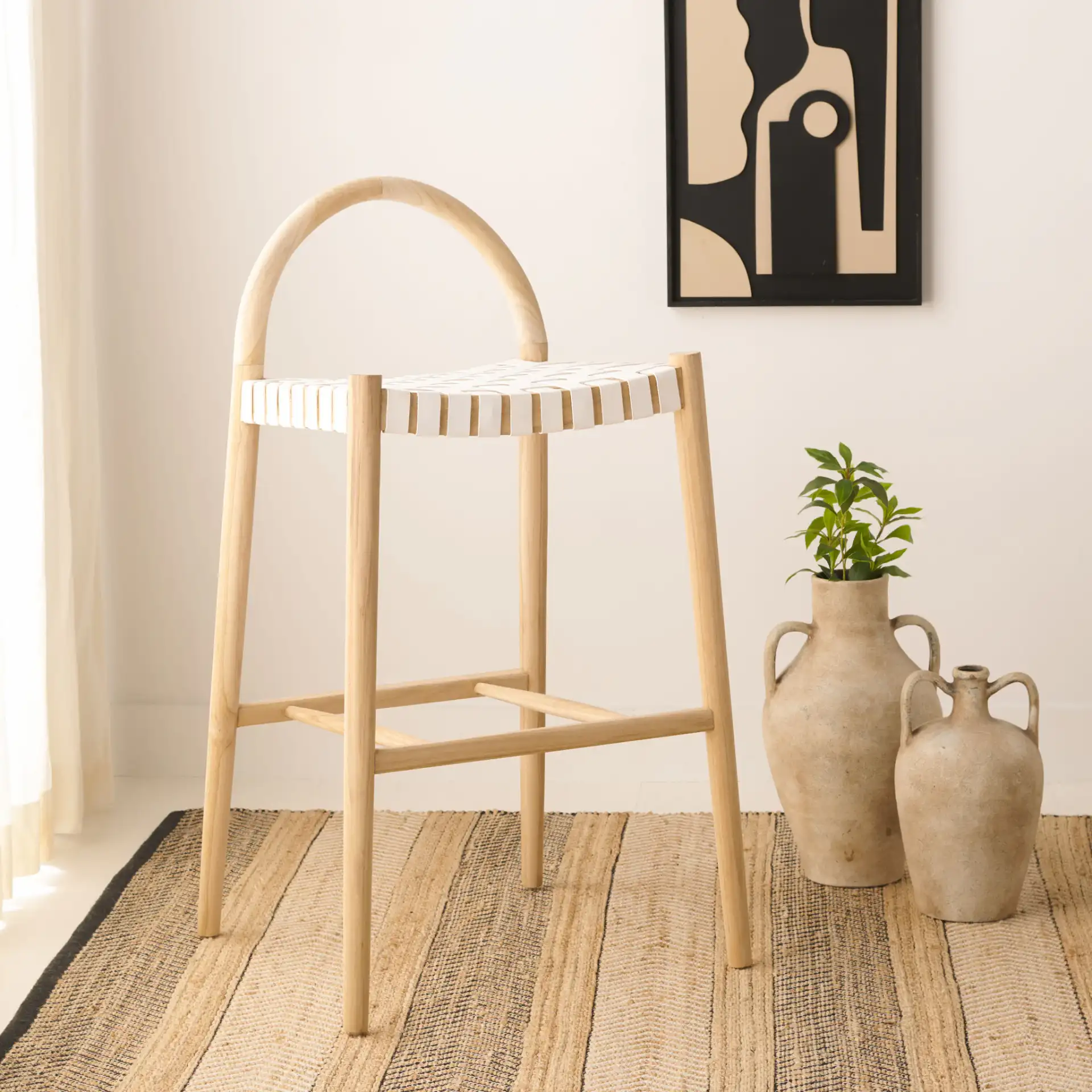 Rhyan Bar Stool in White / Natural in a styled room