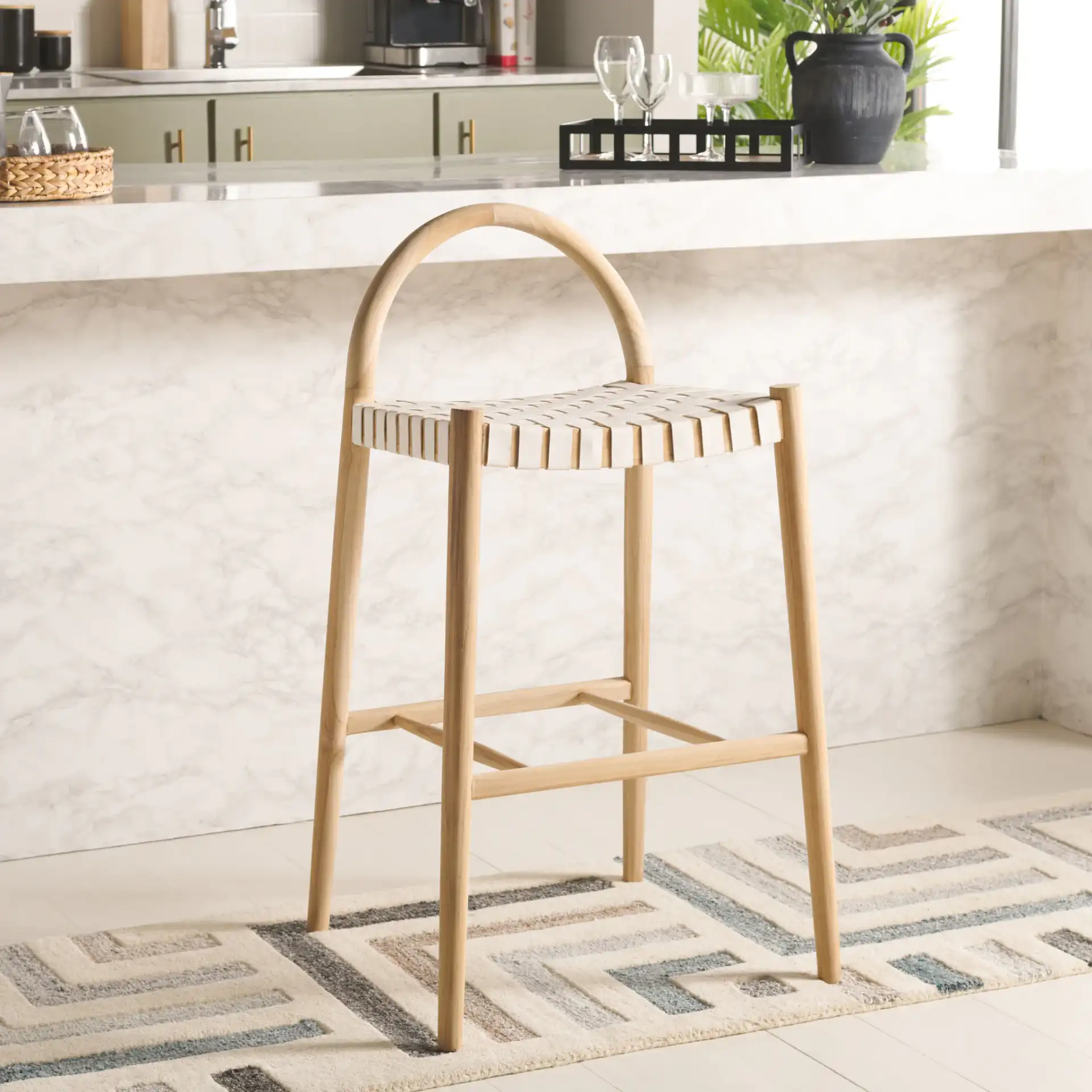 Rhyan Bar Stool in White / Natural in a styled room