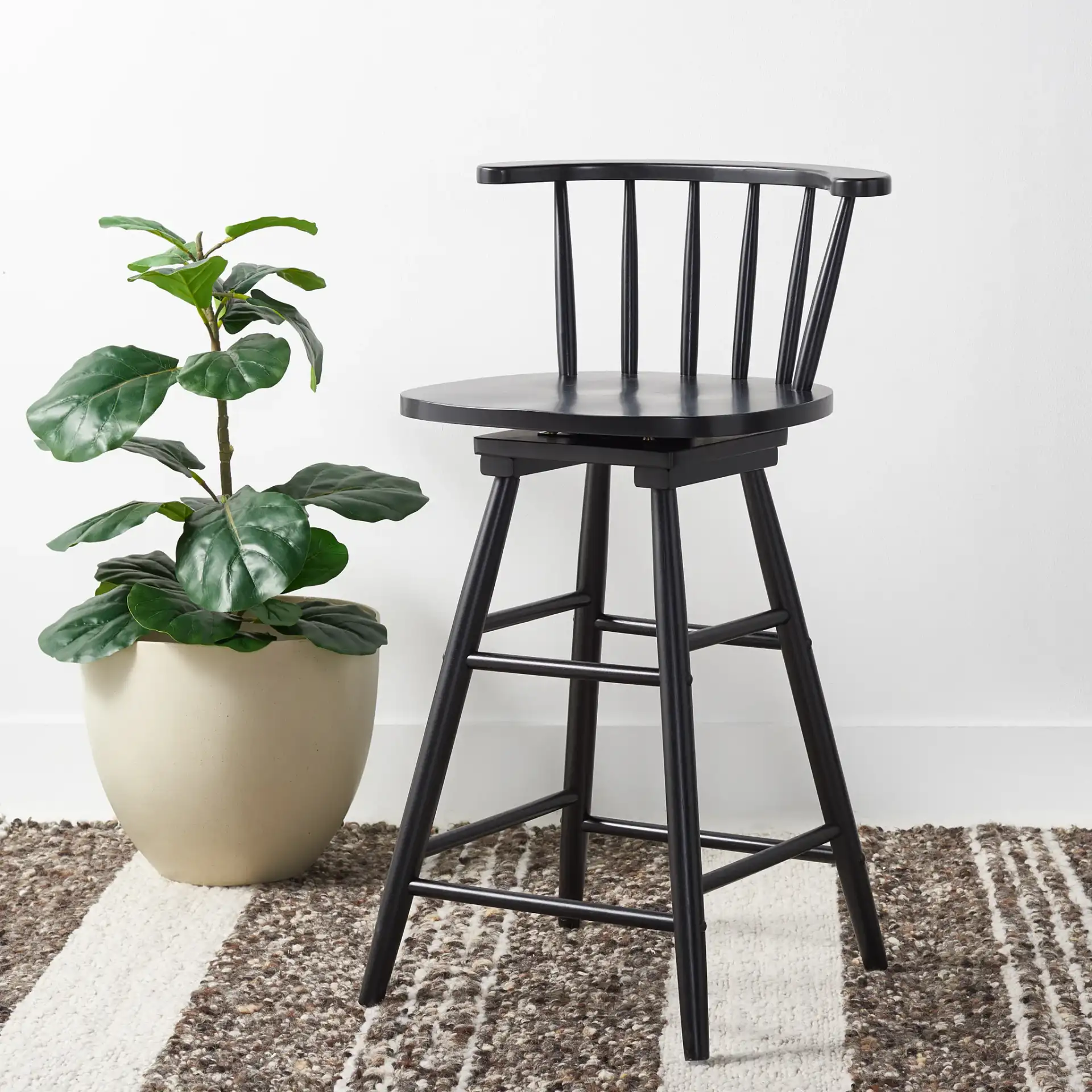 Ray Swivel Counter Stool in Black in a styled room