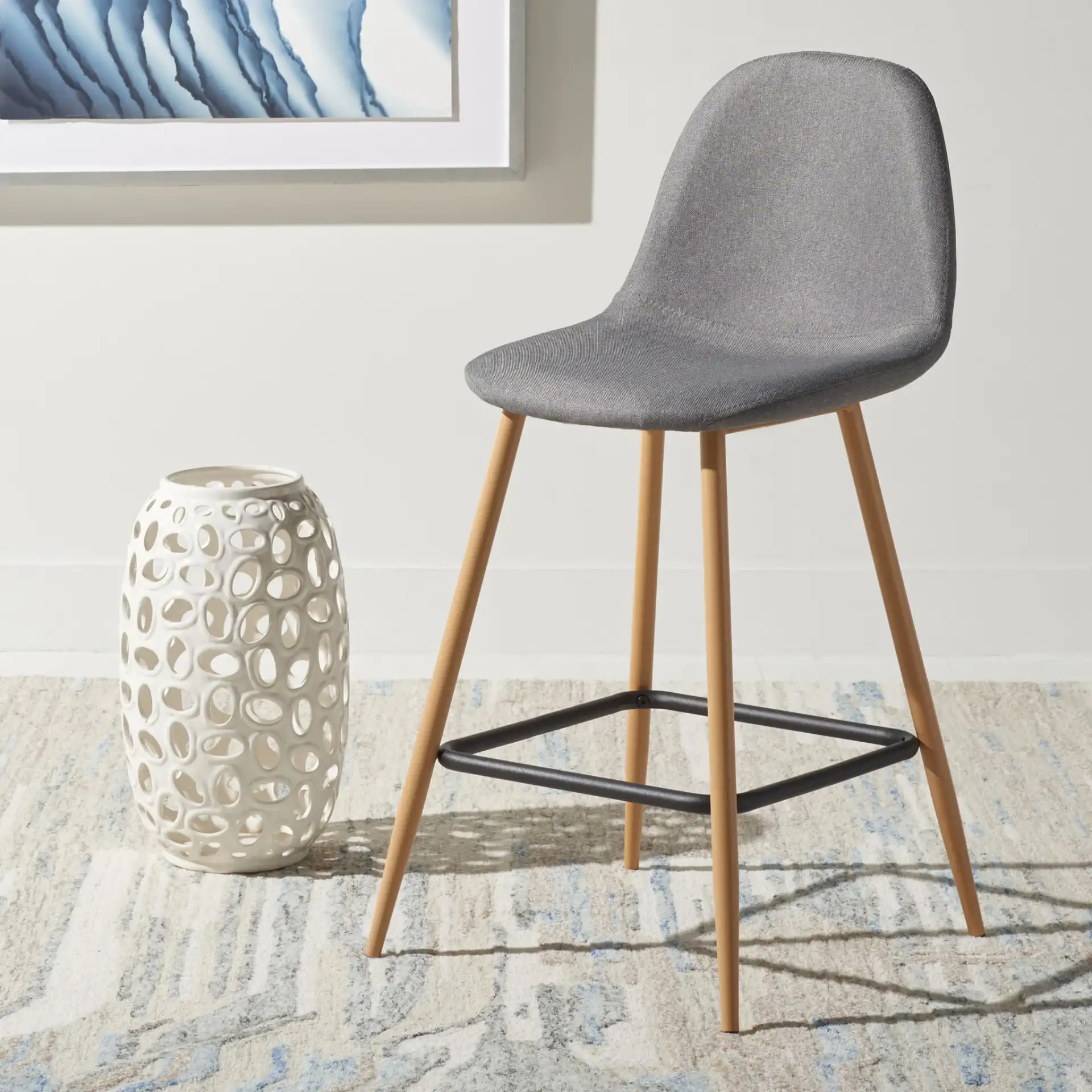 Travis Counter Stool in Dark Gray / Black in a styled room