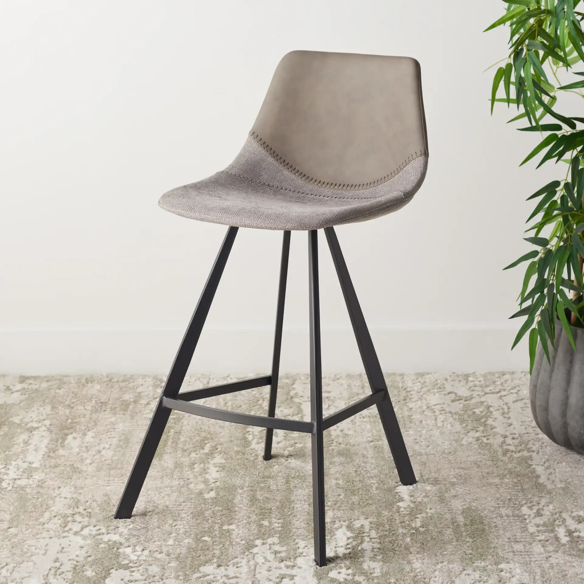 Granger Counter Stool in Gray / Black in a styled room